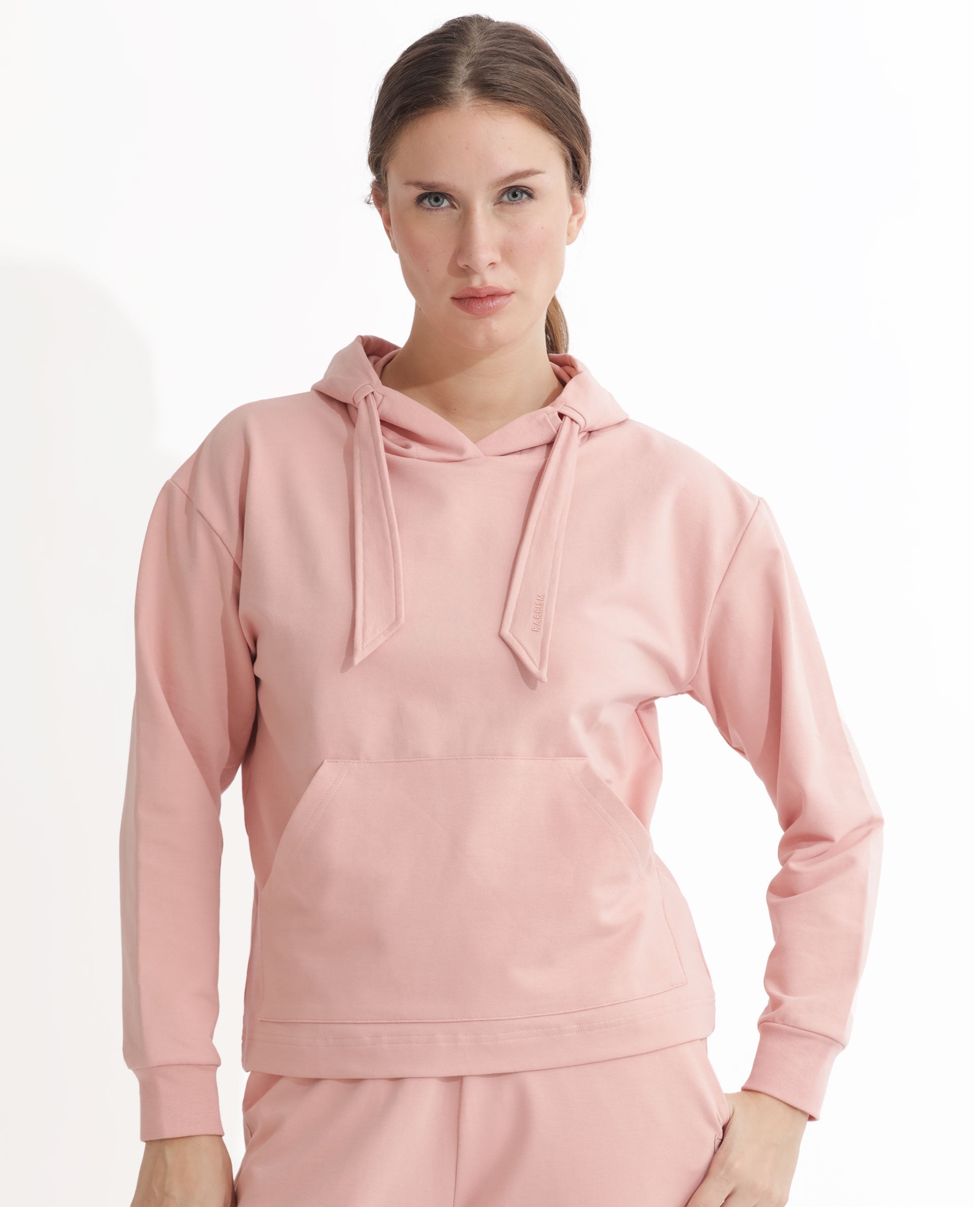 Rareism Women Flynn Light Orange Cotton Lycra Fabric Regular Fit Full Sleeves Solid Hooded Sweatshirt