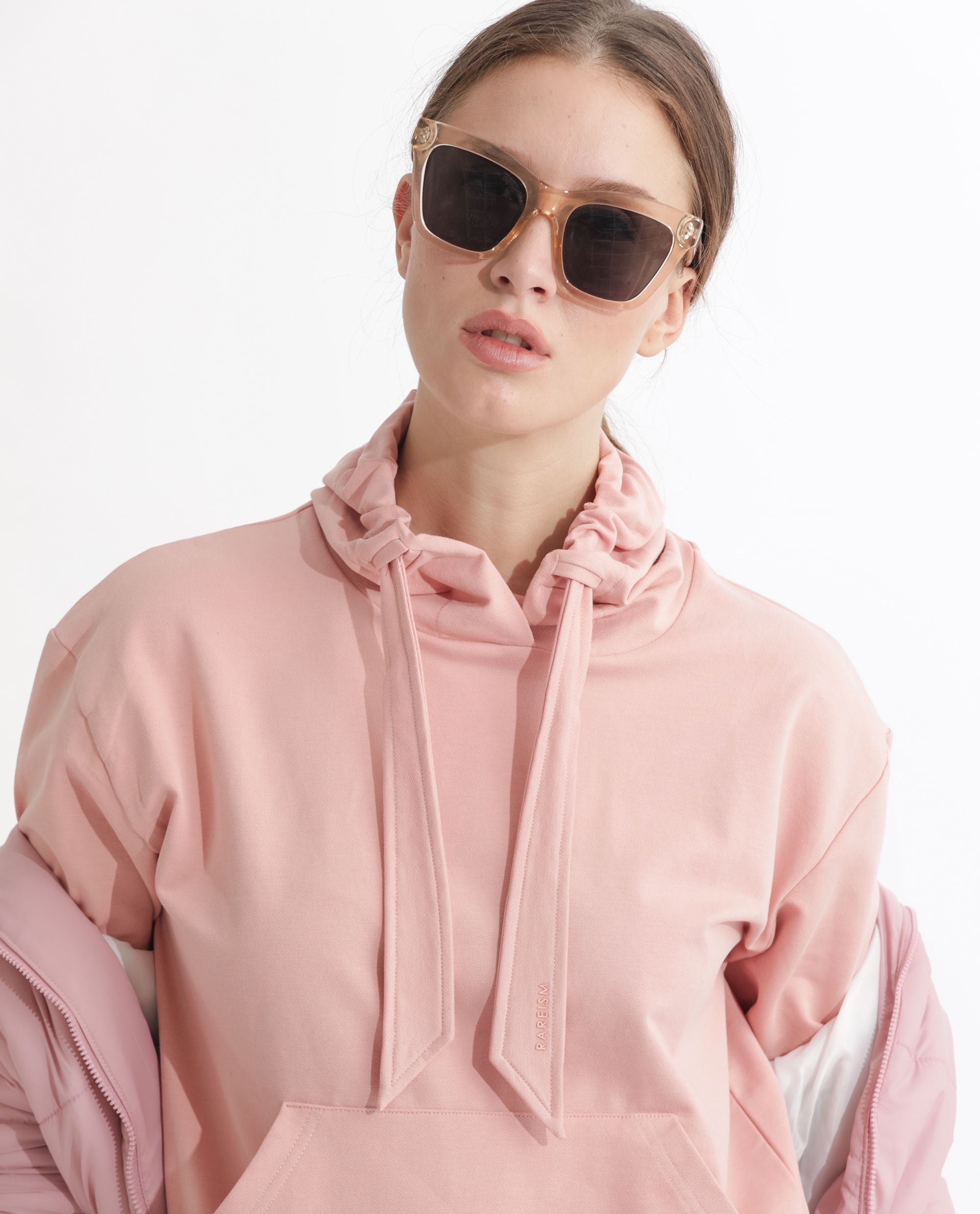 Rareism Women Flynn Light Orange Cotton Lycra Fabric Regular Fit Full Sleeves Solid Hooded Sweatshirt