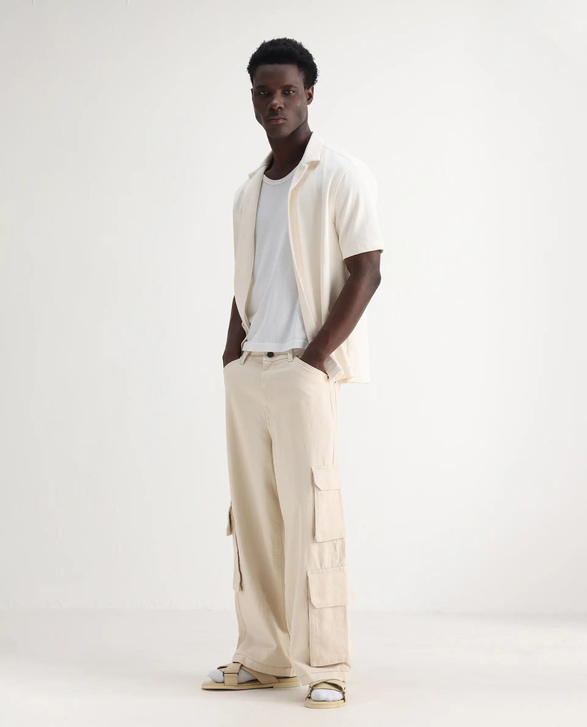 Rare Rabbit Men's Freks Beige Cotton Plain Baggy Fit Jeans