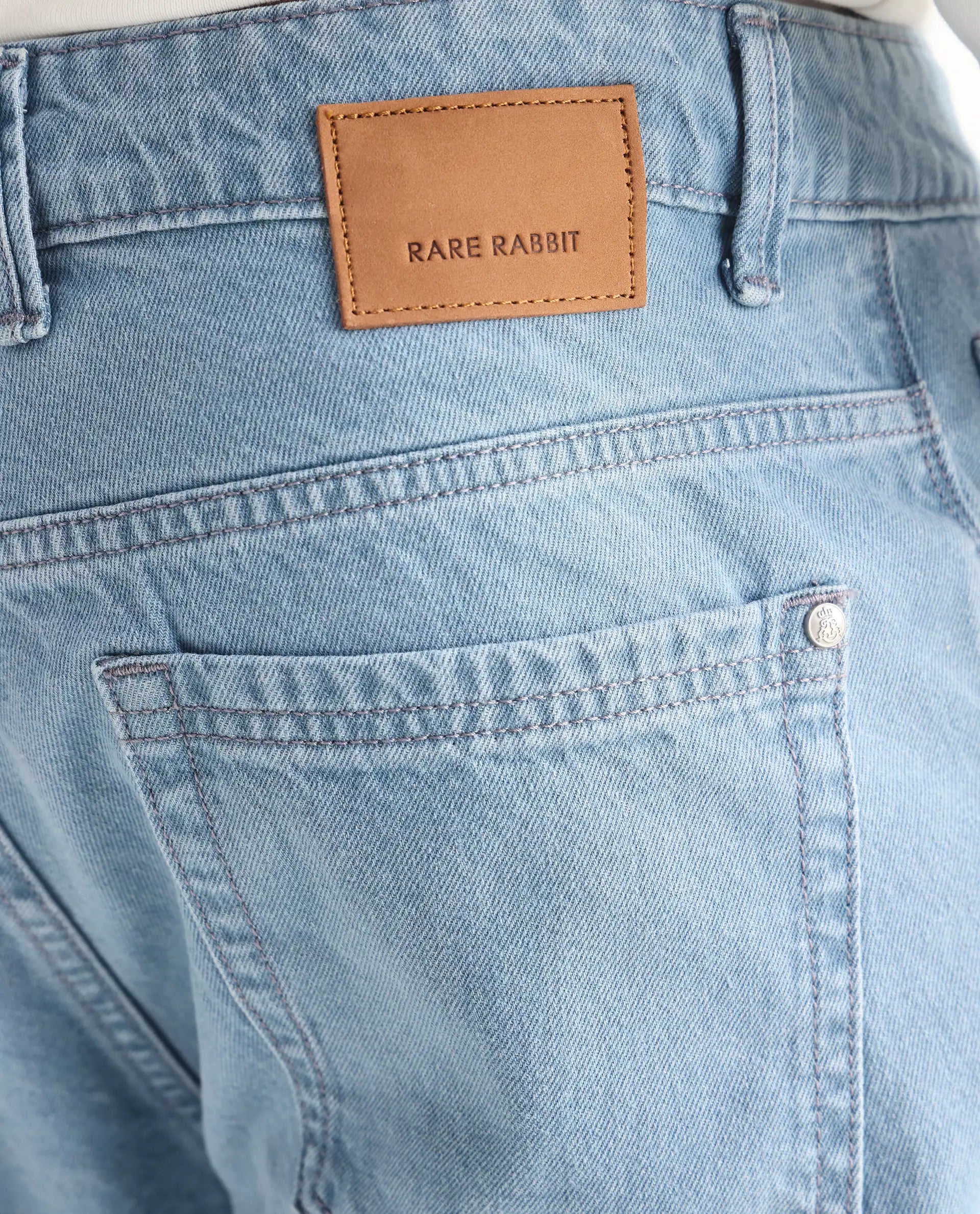 Rare Rabbit Men's Gleb Light Blue Cotton Plain Kurt Carrot Fit Jeans