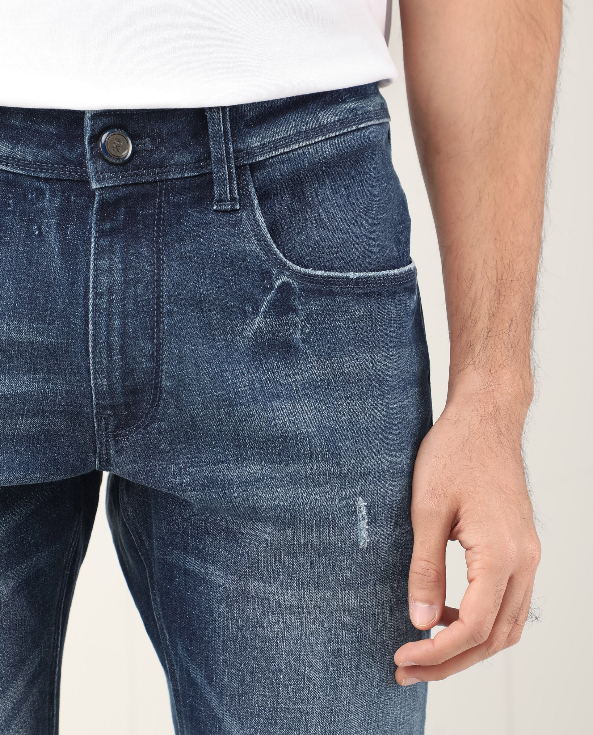 Rare Rabbit Men's Grimm Blue Mid Wash Mid-Rise Mild Distressed Slim Fit Jeans