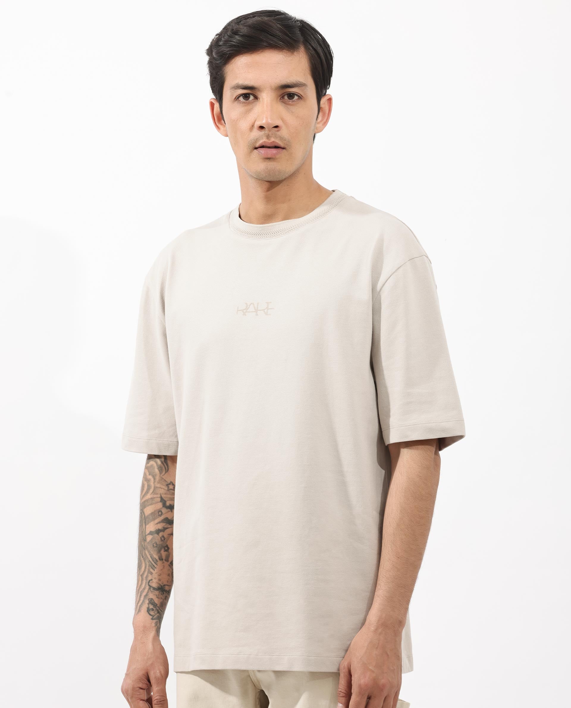 Rare Rabbit Mens Heros Beige Cotton Lycra Fabric Blend Drop Shoulder Short Sleeve Oversized Fit Solid T-Shirt