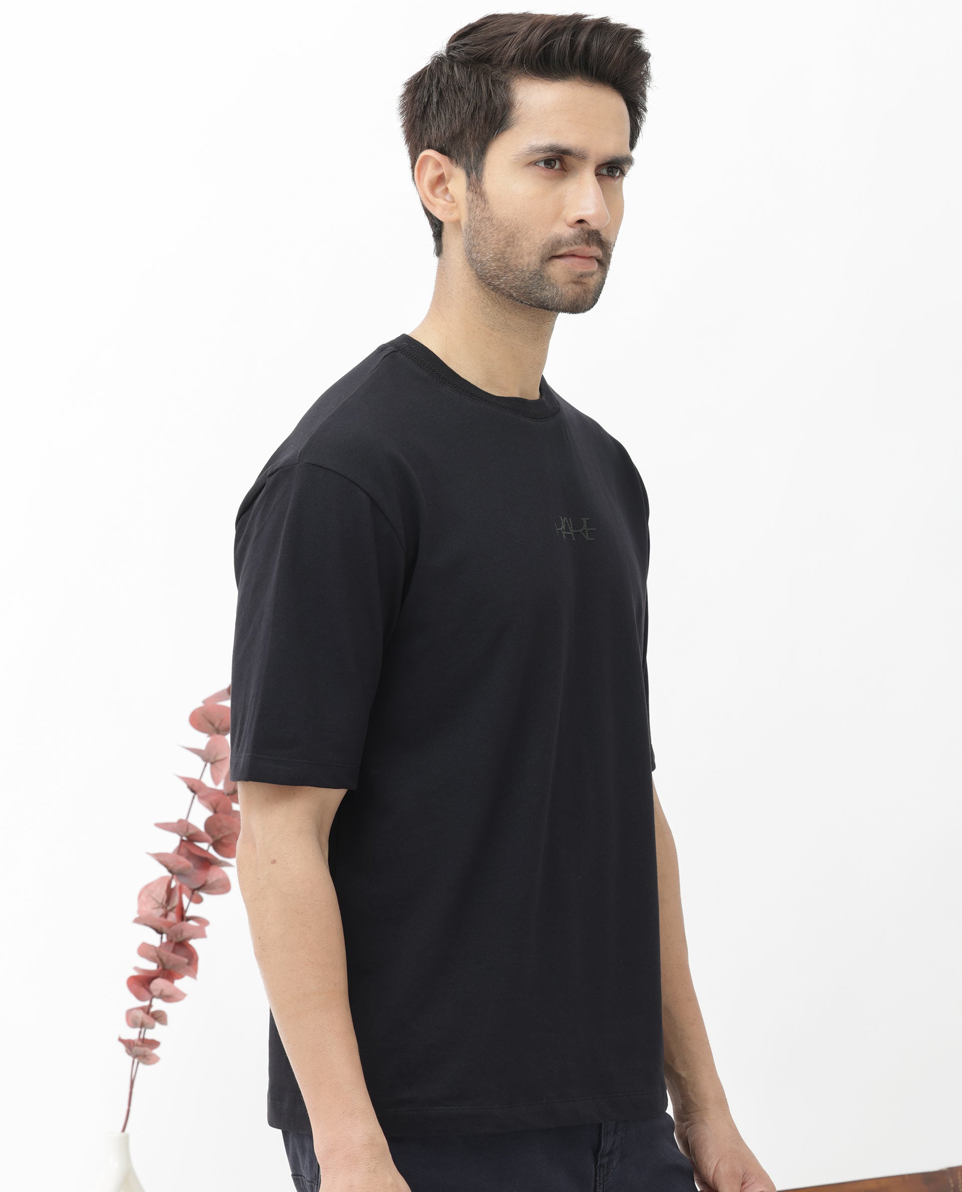 Rare Rabbit Mens Heros Black Cotton Lycra Fabric Blend Drop Shoulder Short Sleeve Oversized Fit Solid T-Shirt