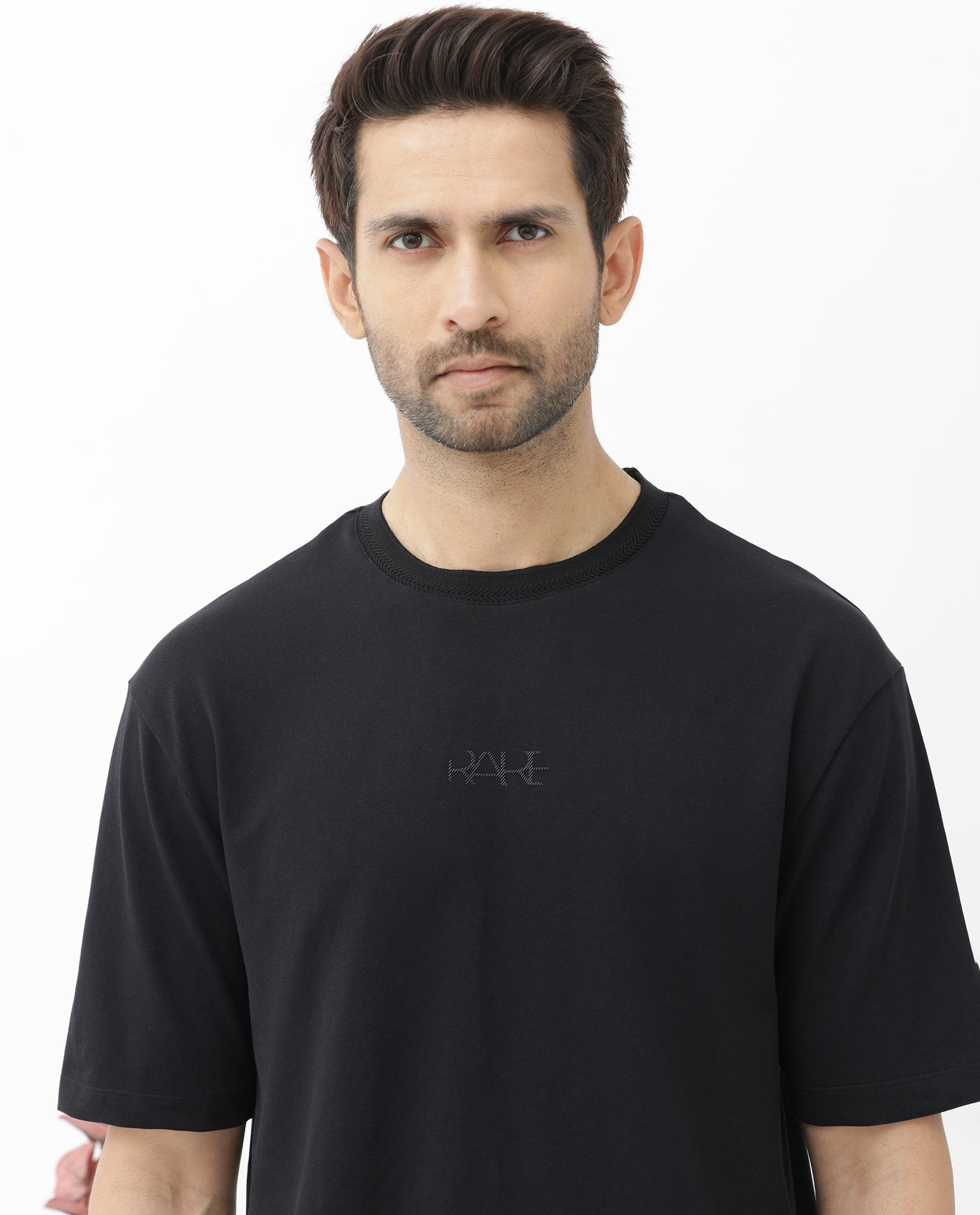 Rare Rabbit Mens Heros Black Cotton Lycra Fabric Blend Drop Shoulder Short Sleeve Oversized Fit Solid T-Shirt