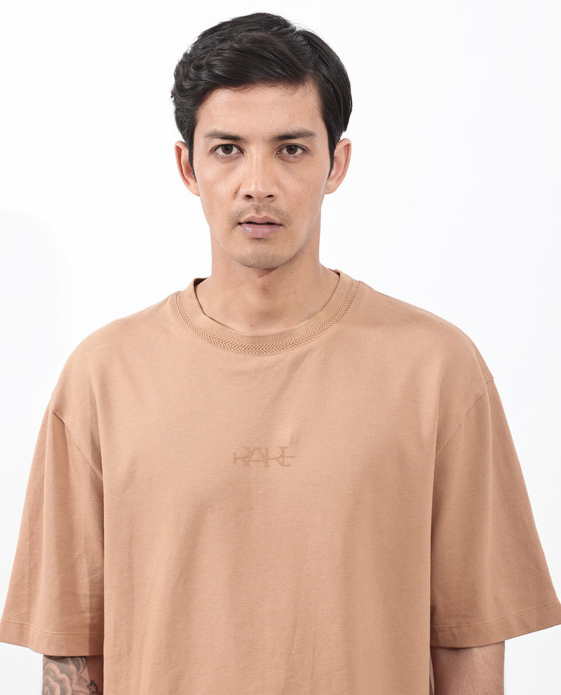 Rare Rabbit Mens Heros Dusky Orange Cotton Lycra Fabric Blend Drop Shoulder Short Sleeve Oversized Fit Solid T-Shirt