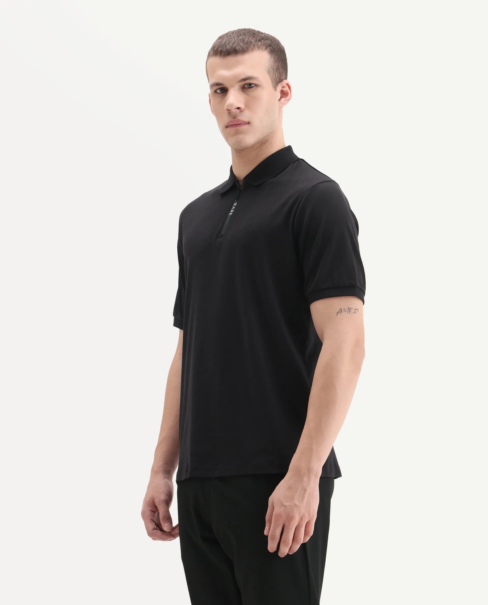 Rare Rabbit Men's Holit-1 Black Cotton Plain Regular Fit Half Sleeve Polo