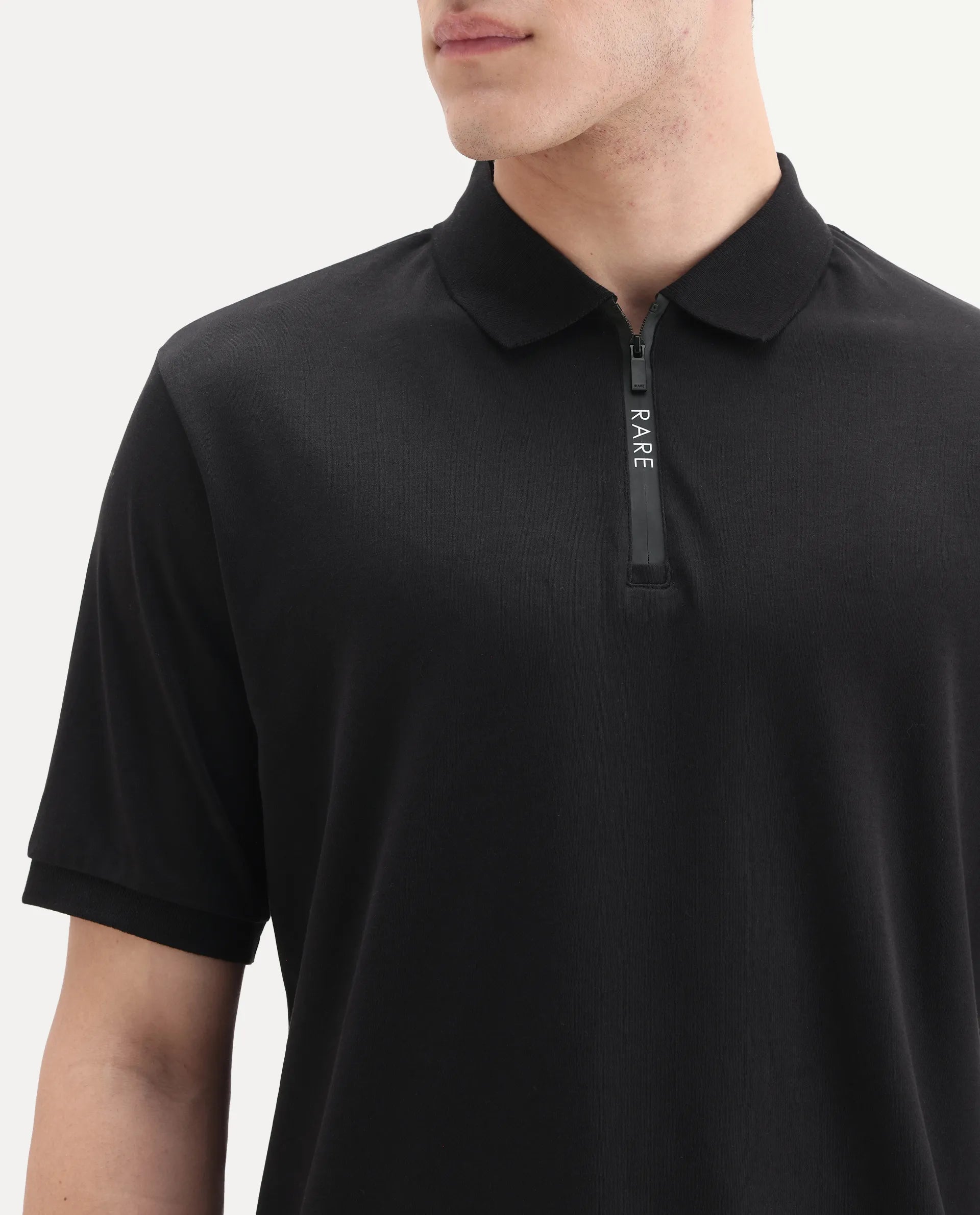 Rare Rabbit Men's Holit-1 Black Cotton Plain Regular Fit Half Sleeve Polo