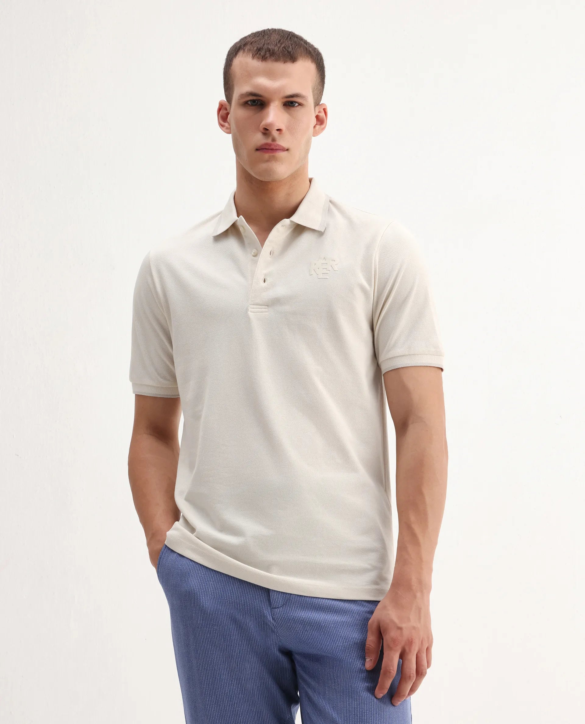 Rare Rabbit Men's Hux Pastel Yellow Cotton Plain Regular Fit Half Sleeve Polo