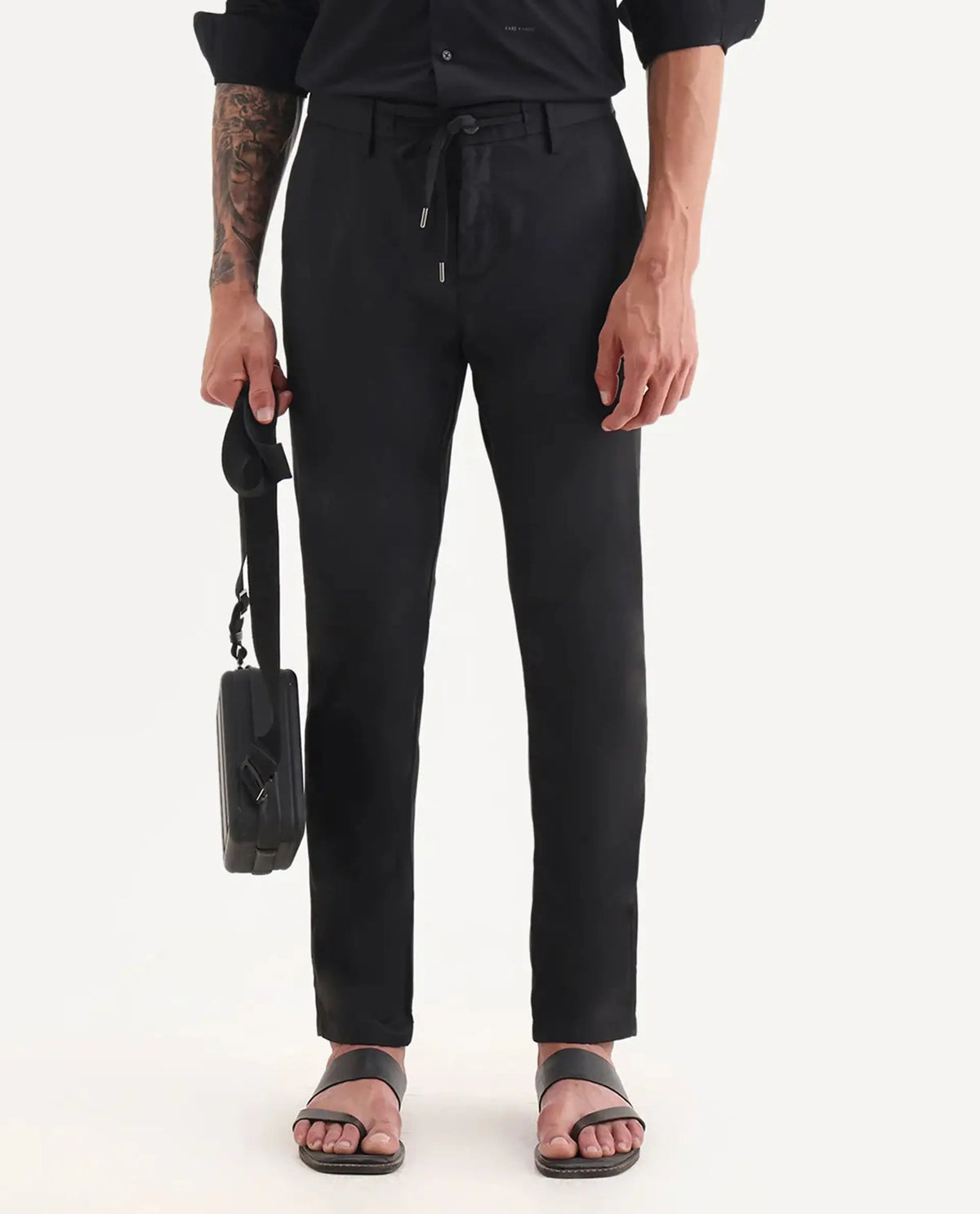 Rare Rabbit Men's Nimb Black Polyester Fabric Drawstring And Button Closure High Rise Regular Fit Solid Trousers