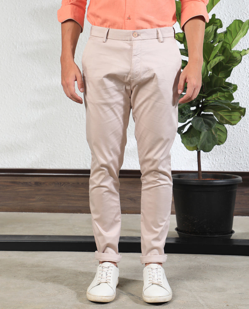 Rare Rabbit Men's Shines Pink Solid Mid-Rise Regular Fit Stretch Trousers