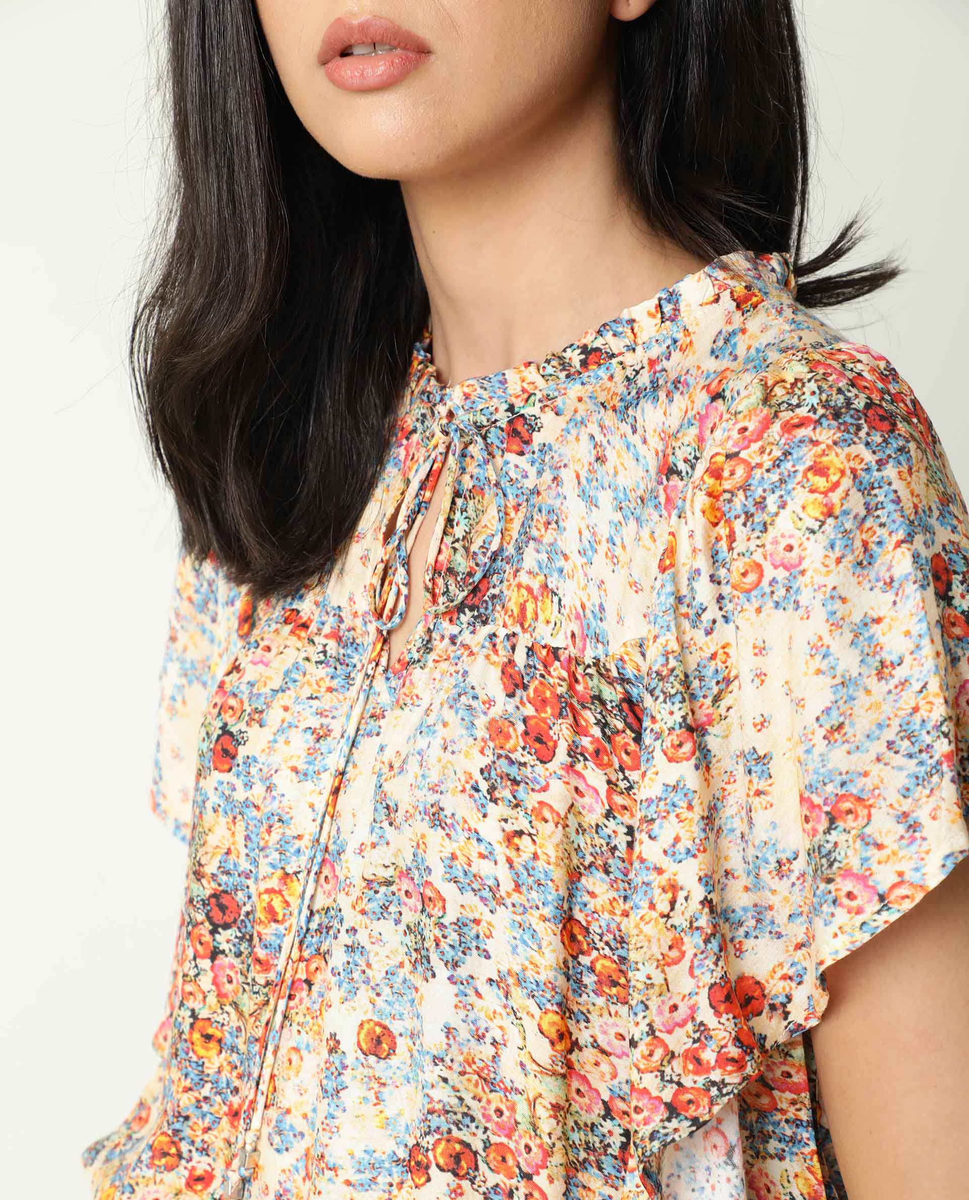 Rareism Women Nigel Off White Cotton Silk Fabric Relaxed Fit Tie-Up Neck Half Sleeves Floral Print Top