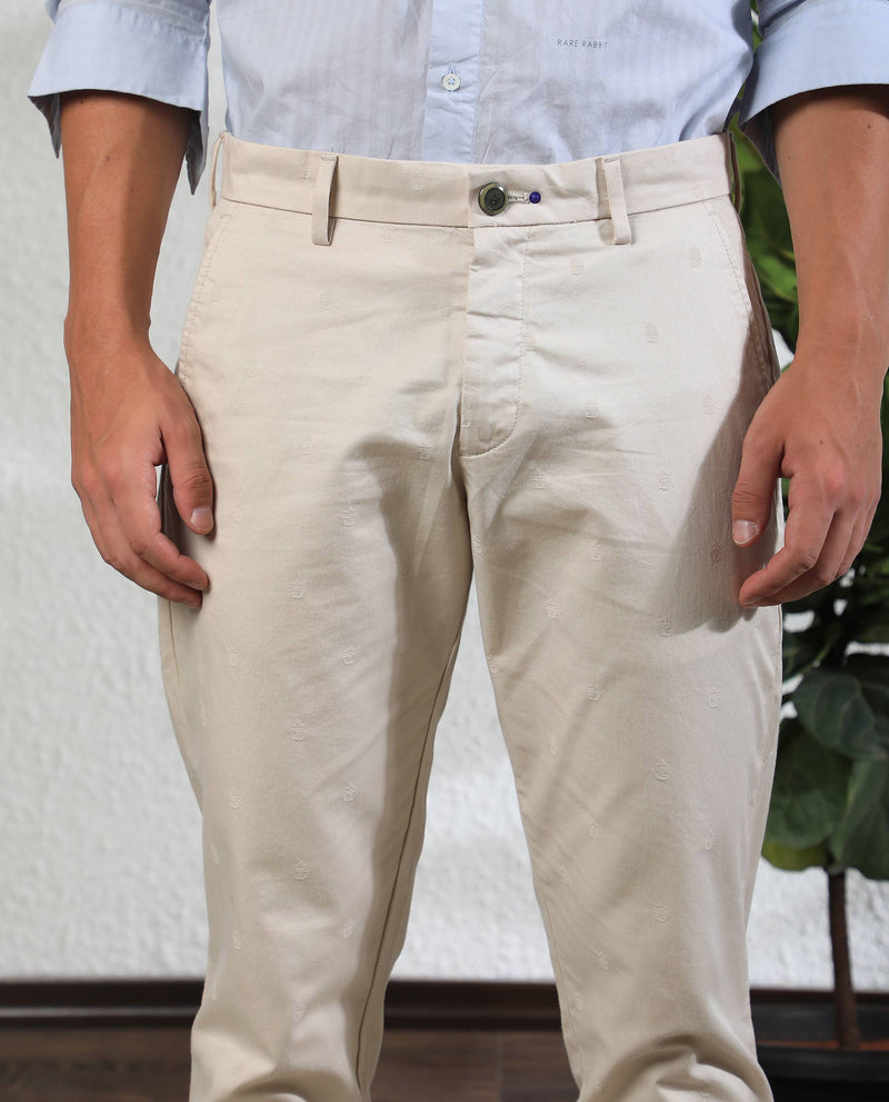 Rare Rabbit Men'S Mazzios Beige Solid Mid-Rise Regular Fit Stretch Trouser
