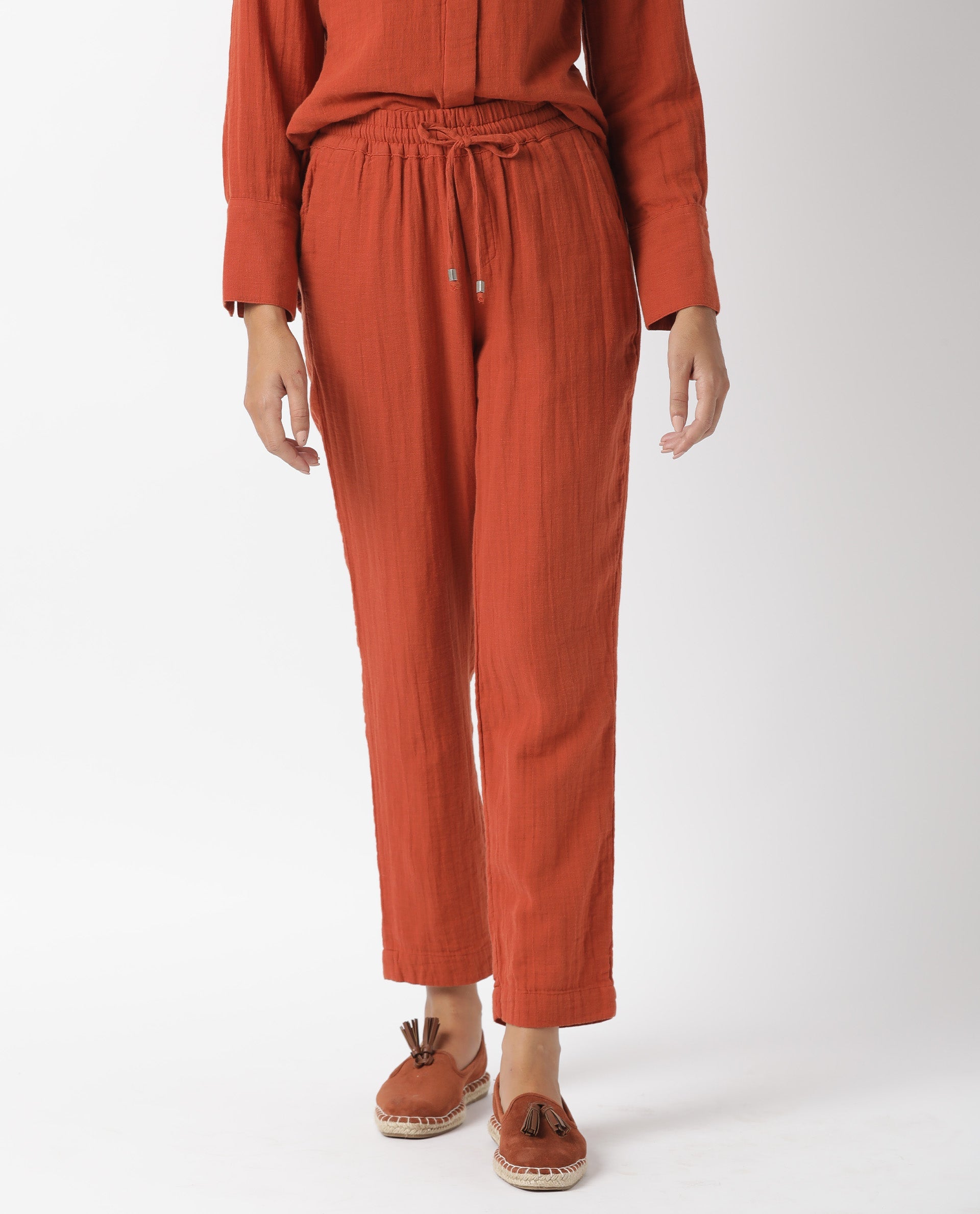 Rareism Women Elo Dark Rust Cotton Fabric Regular Fit Mid Rise Solid Ankle Length Trousers
