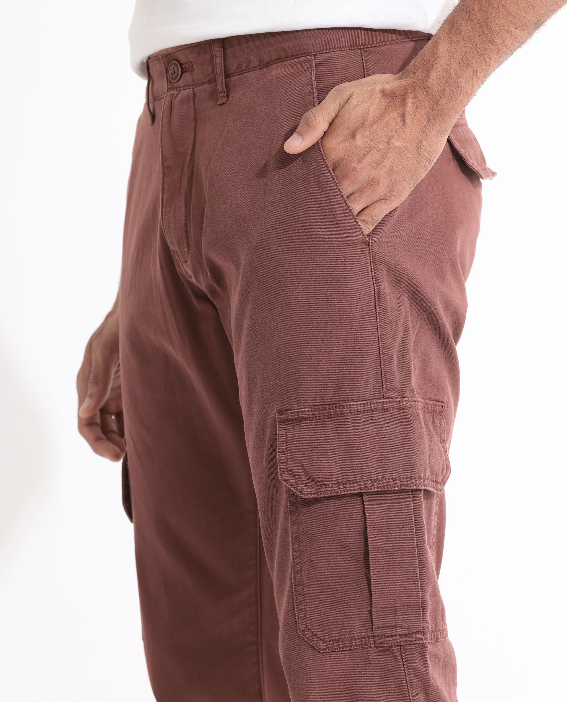Model wearing brown color cargo pants or cargo trousers Stock Photo | Adobe  Stock