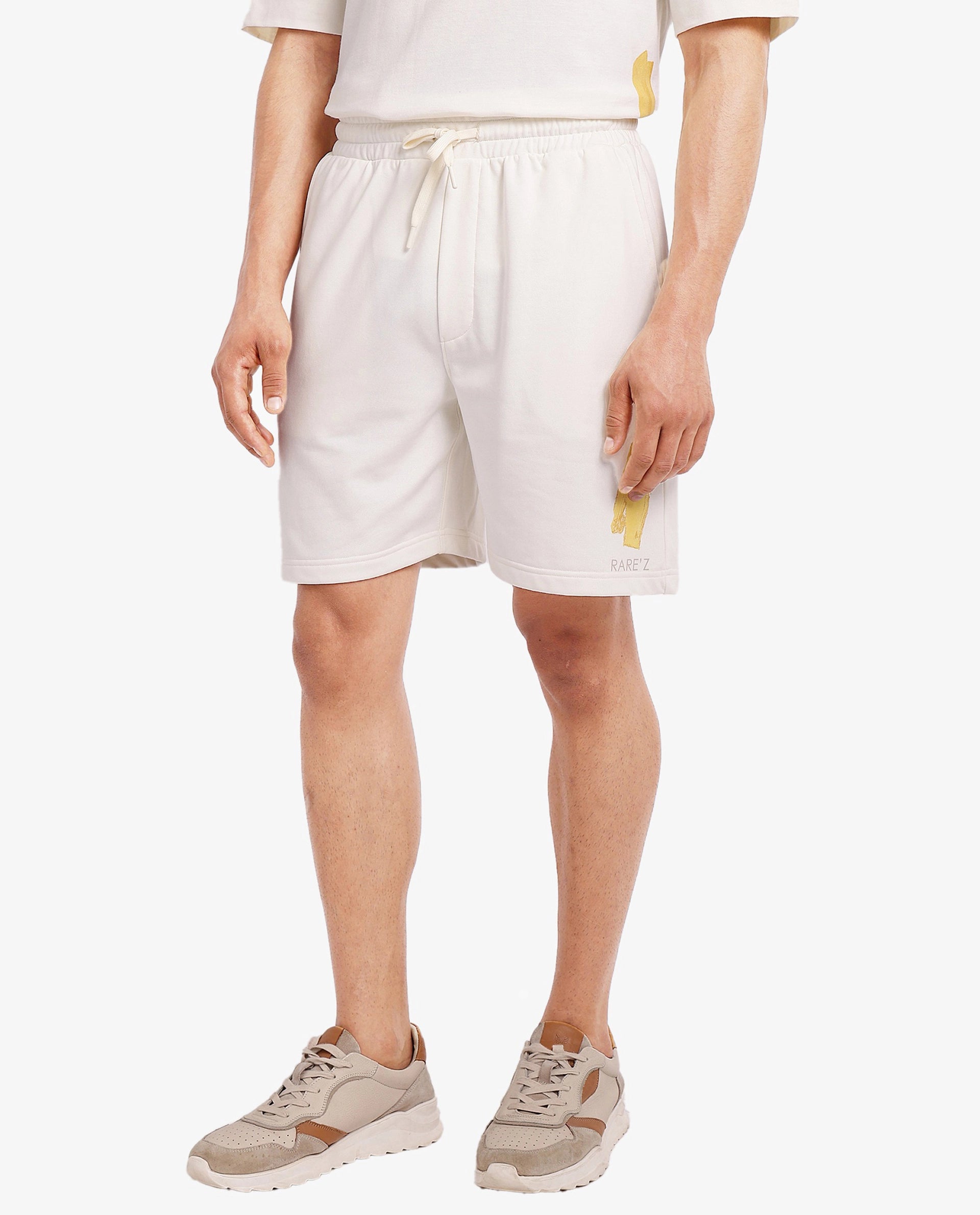 Rare Rabbit Men Jadez-B Off White Cotton Fabric Placement Print Drawstring Closure Oversized Fit Shorts