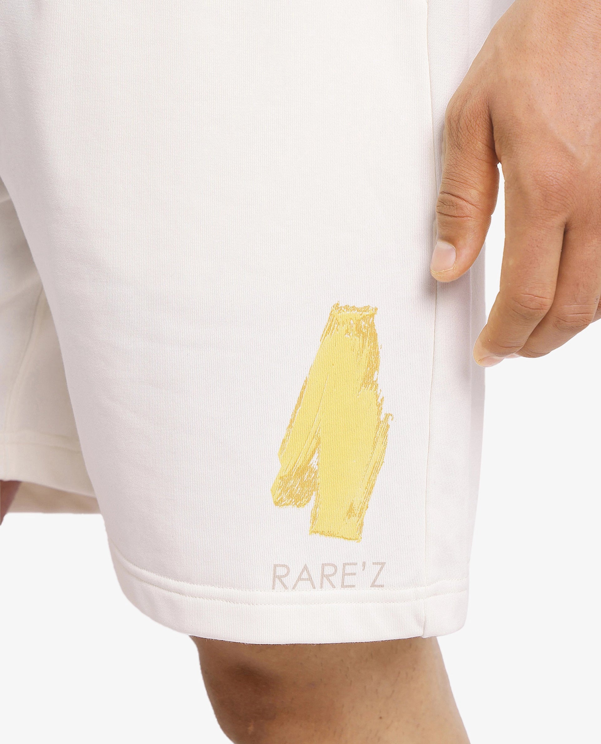 Rare Rabbit Men Jadez-B Off White Cotton Fabric Placement Print Drawstring Closure Oversized Fit Shorts