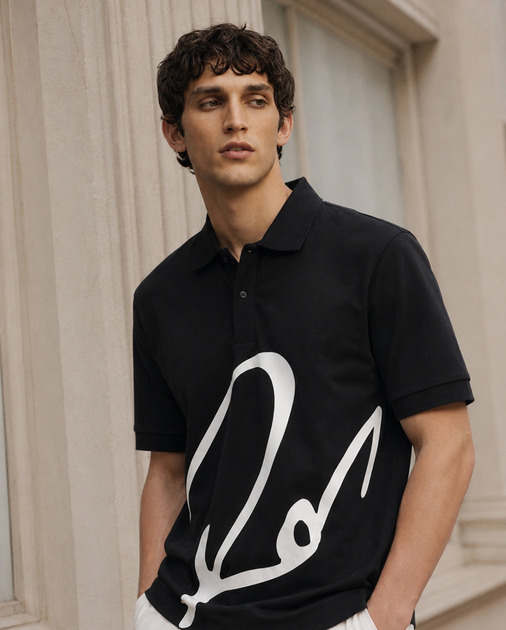 Rare Rabbit Men's Jefra Black Cotton Blend Regular Fit Half Sleeves Graphic Print Polo