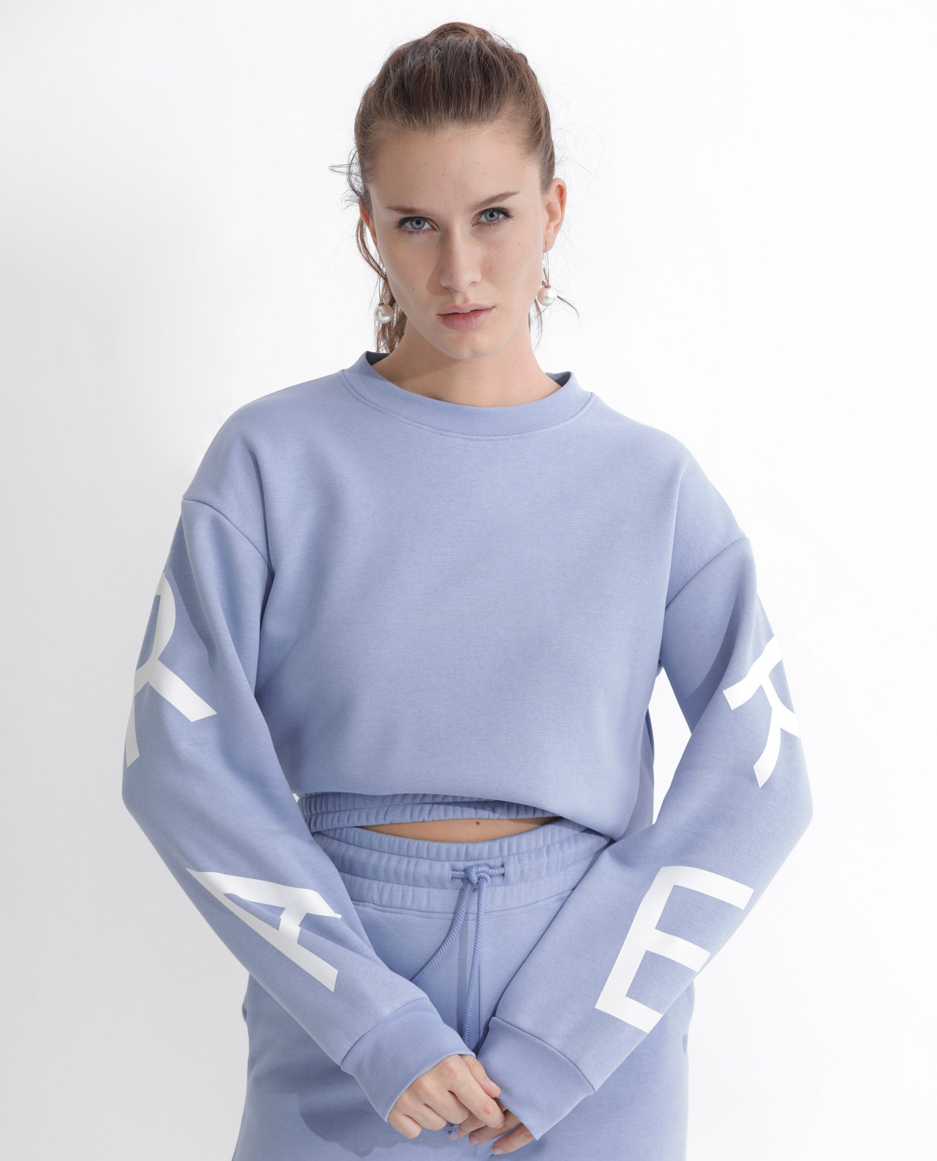 Rareism Articale Women Jonice Light Blue Poly Cotton Fabric Full Sleeves Crew Neck Regular Fit Graphic Print Cropped Sweatshirt