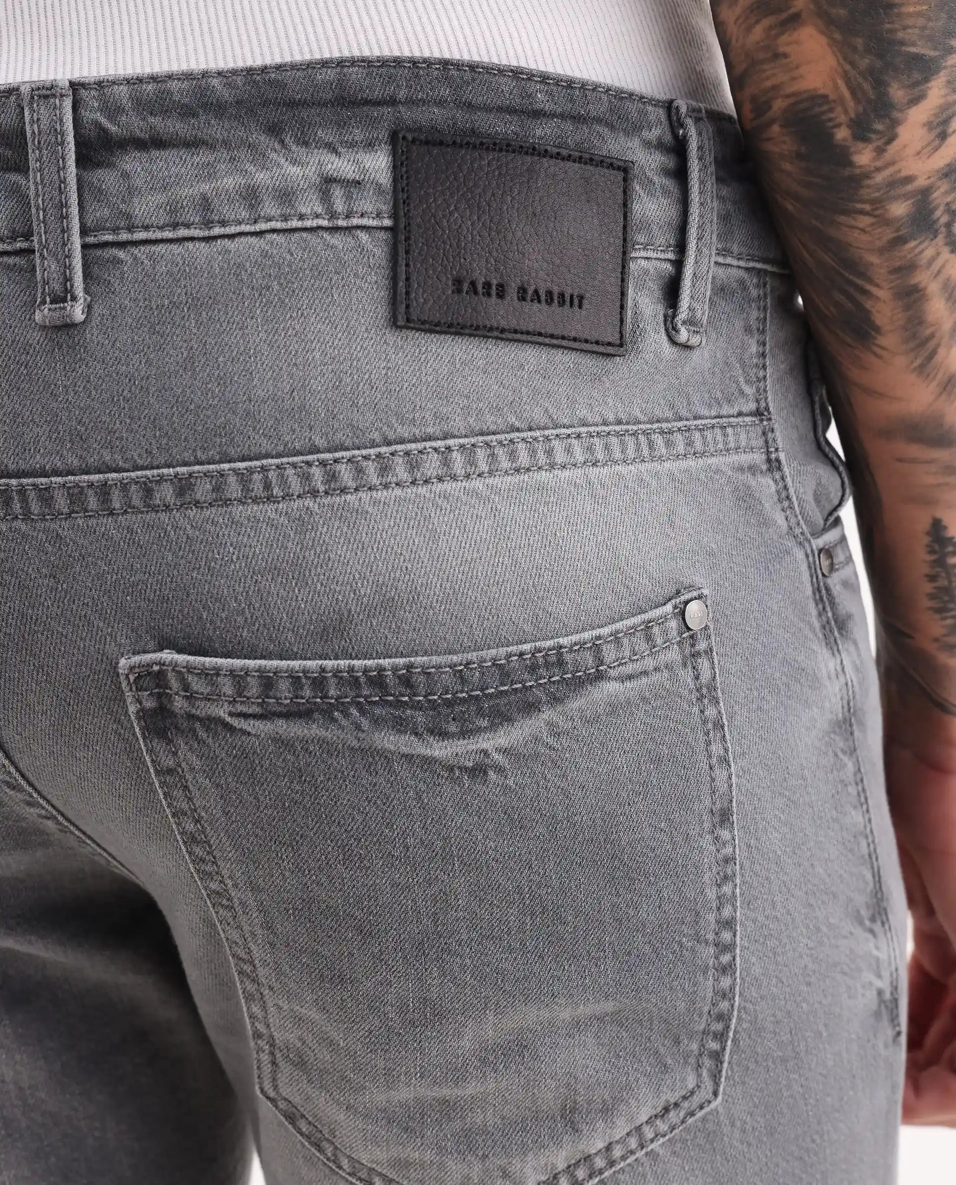Rare Rabbit Men's Kairo-2 Grey Cotton Fabric Kurt Carrot Plain Jeans