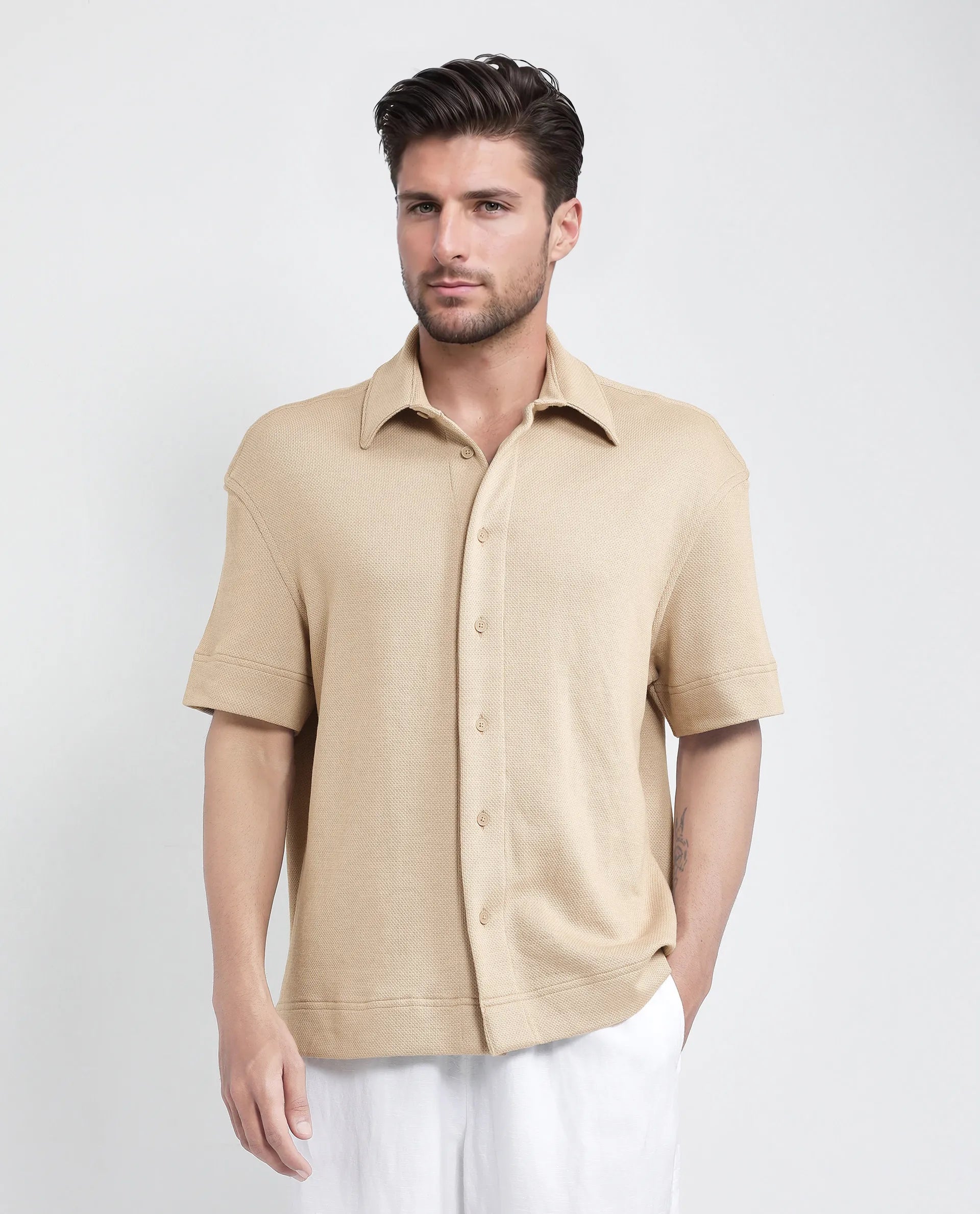 Rare Rabbit Men Kash Beige Viscose Fabric Half Sleeve Collared Neck Button Closure Oversized Fit Plain Shirt