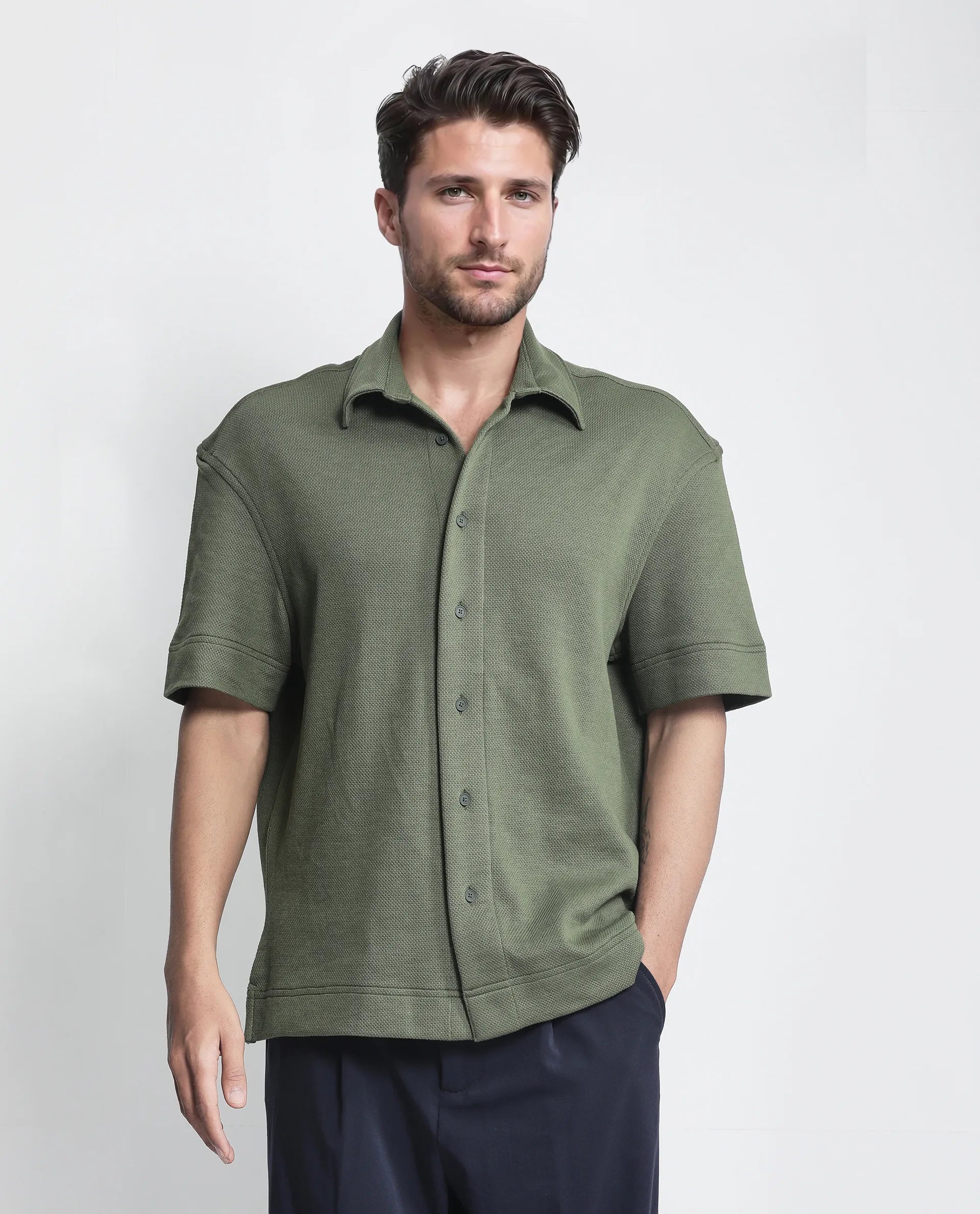 Rare Rabbit Men Kash Dark Green Viscose Fabric Half Sleeve Collared Neck Button Closure Oversized Fit Plain Shirt