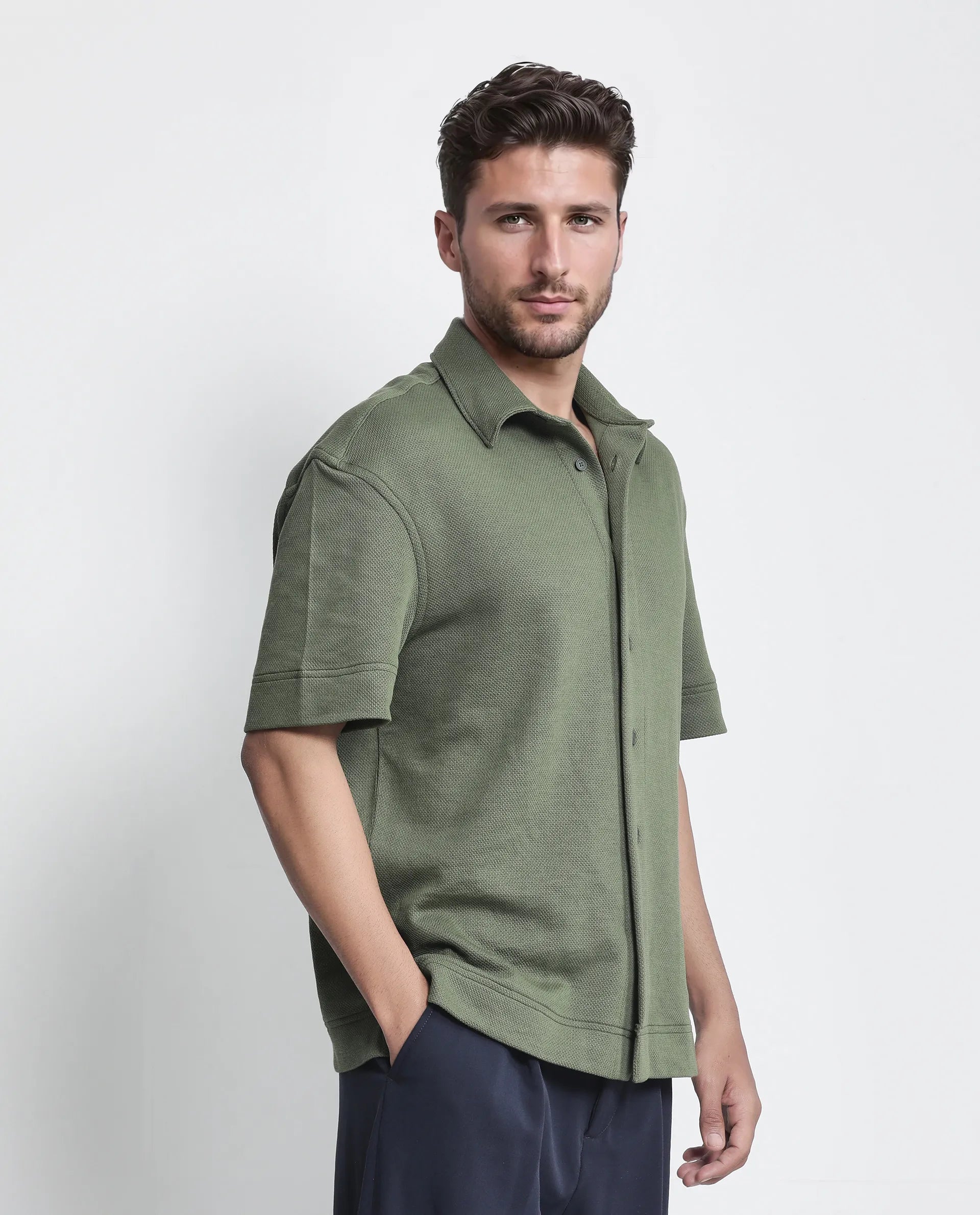 Rare Rabbit Men Kash Dark Green Viscose Fabric Half Sleeve Collared Neck Button Closure Oversized Fit Plain Shirt