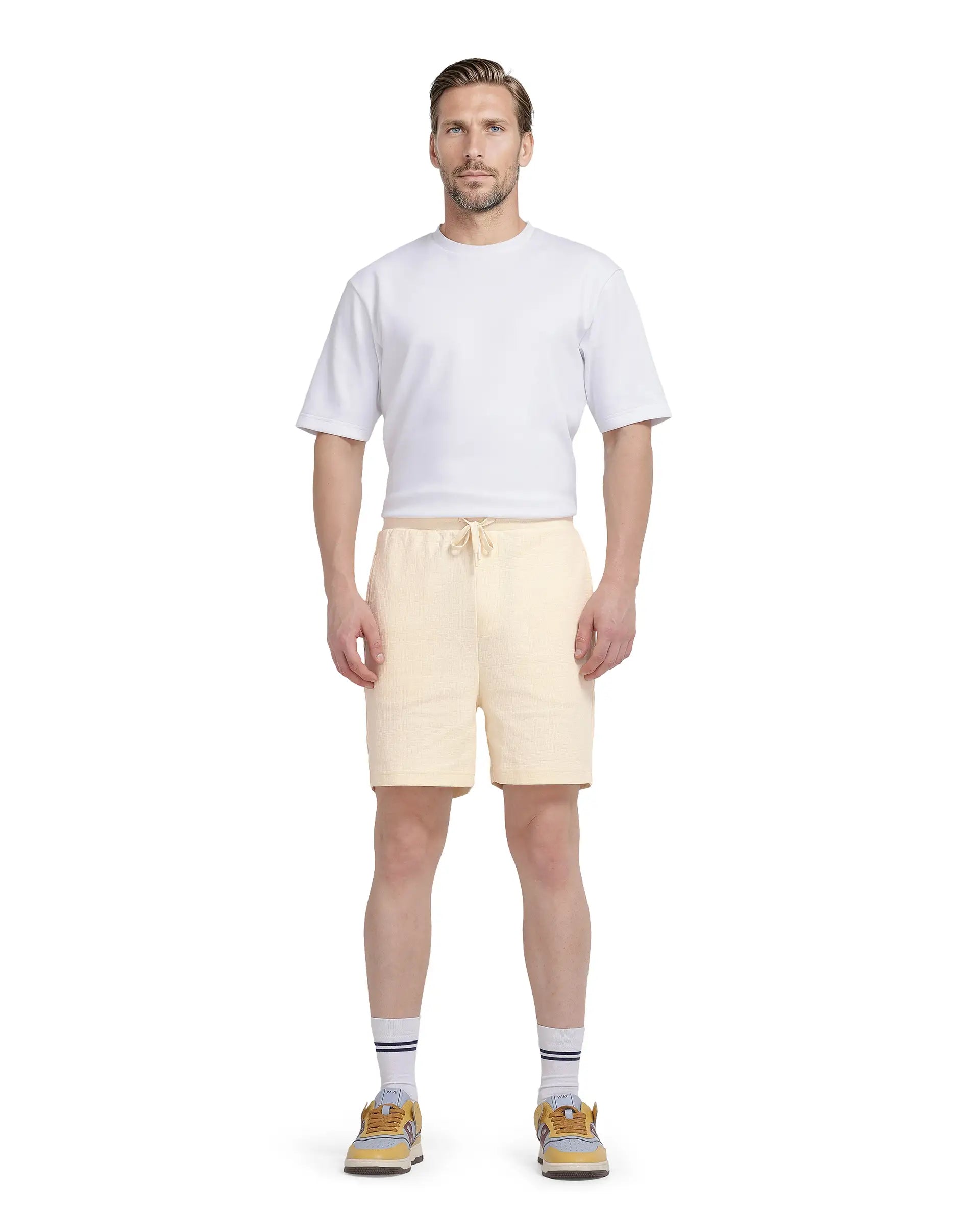 Rare Rabbit Men Kelor Pastel Yellow Cotton Elastane Fabric Drawstring Closure Back Label Plain Shorts