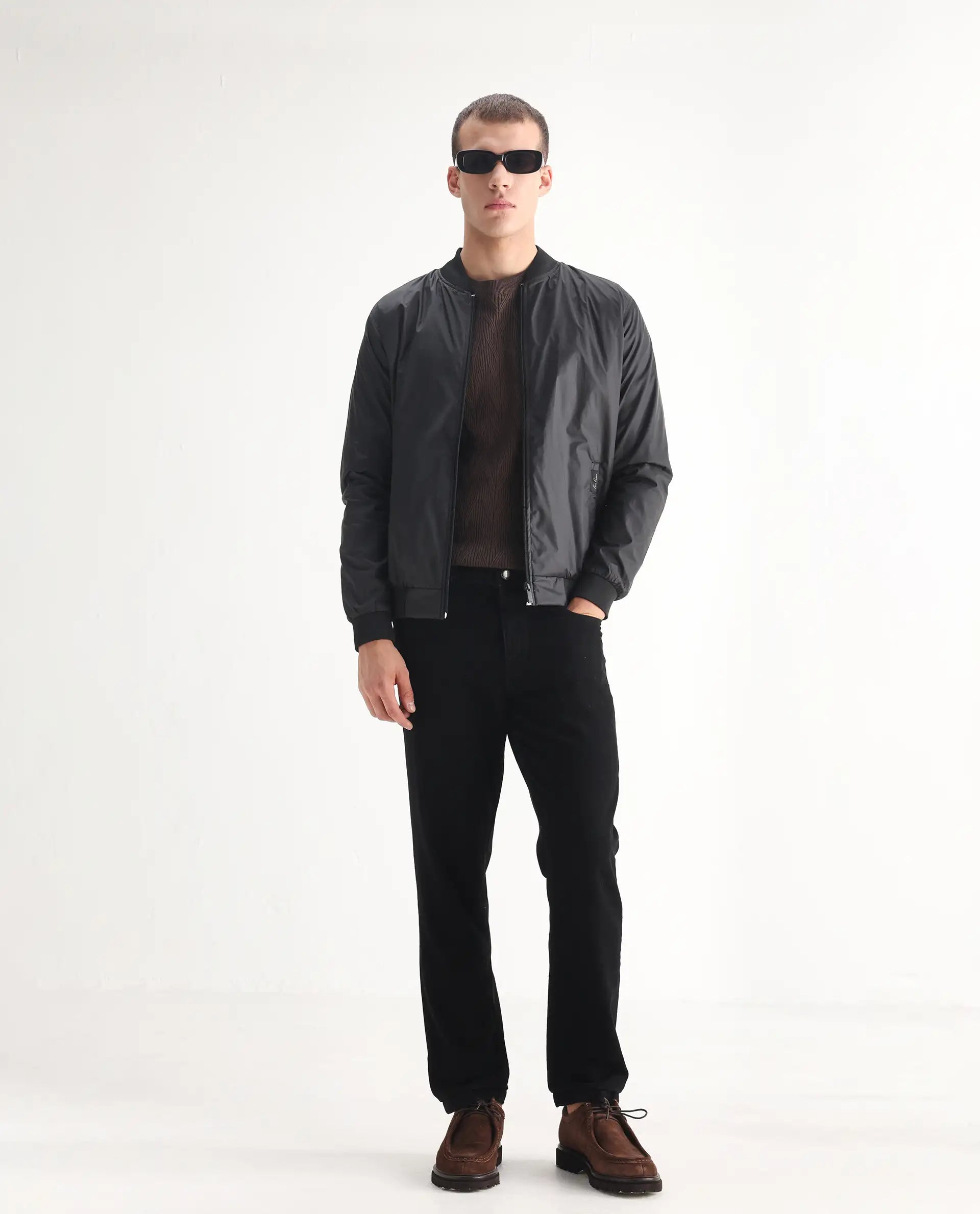 Rare Rabbit Men's Khal Black Cotton Plain Kurt Carrot Fit Jeans