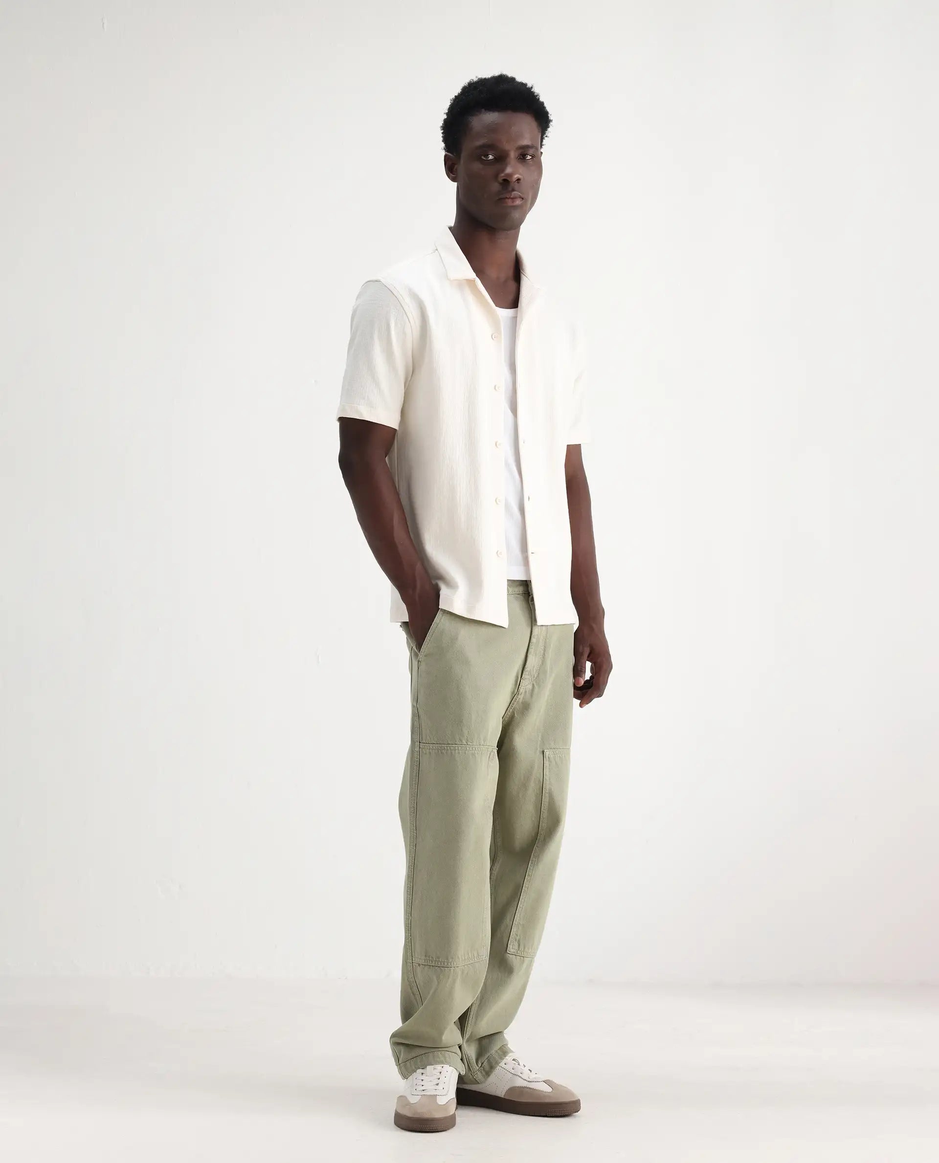 Rare Rabbit Men's Klop Pastel Green Cotton Plain Carpenter Fit Jeans