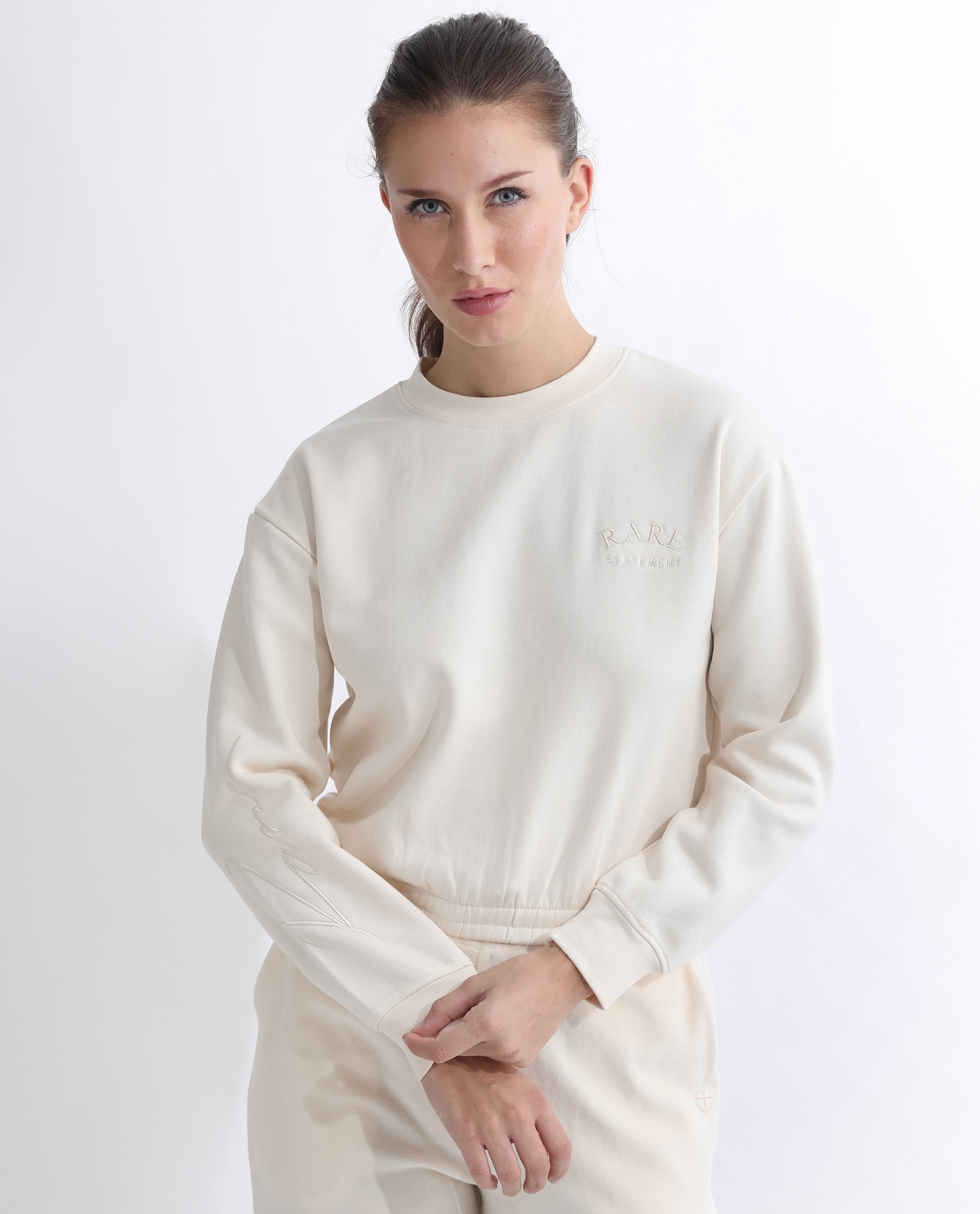 Rareism Articale Women Krok Beige Poly Cotton Fabric Full Sleeves Cuffed Sleeve Round Neck Regular Fit Plain Cropped Sweatshirt