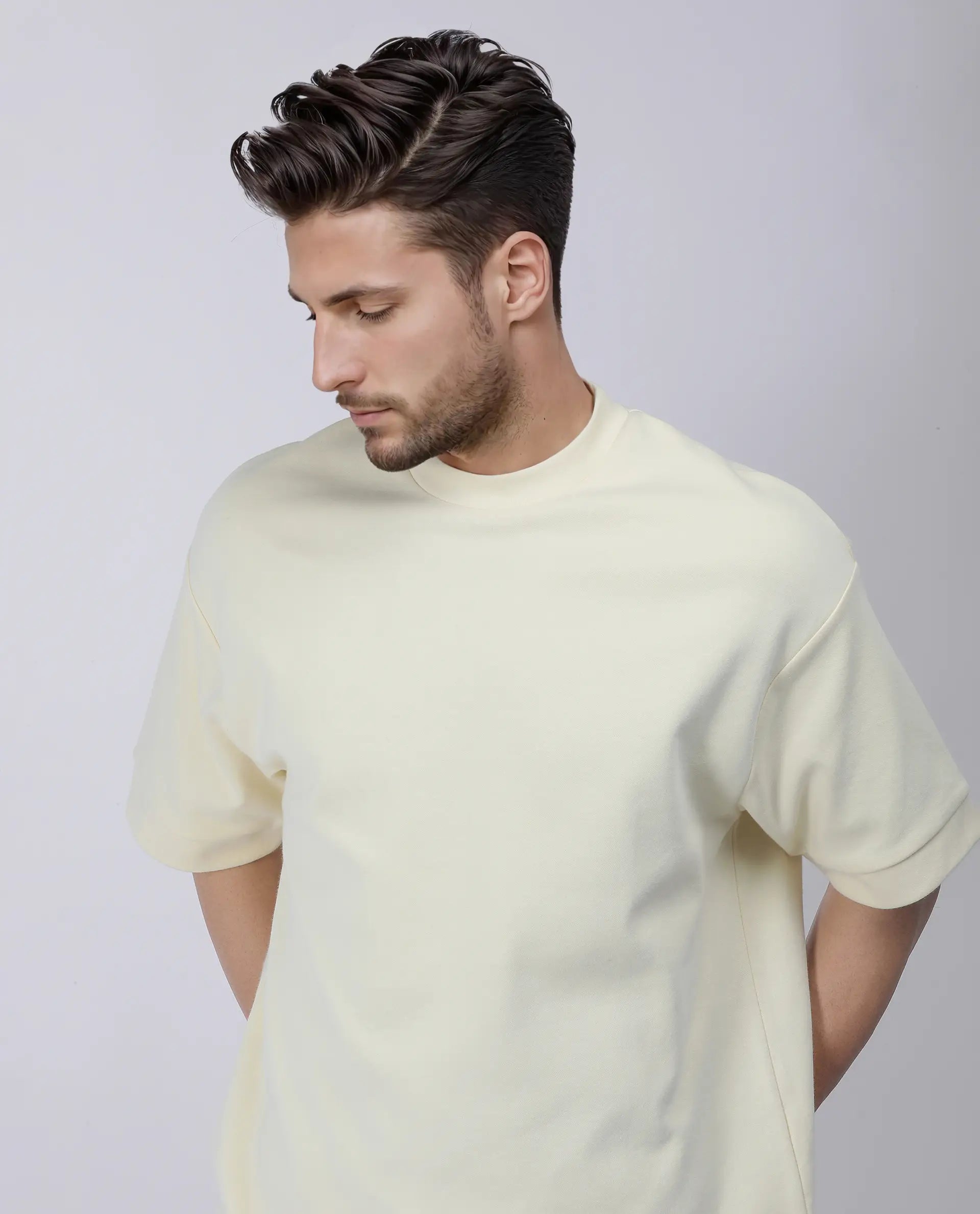 Rare Rabbit Men's Lauch Pastel Yellow Cotton Blend Plain Oversized Fit Half Sleeve Crew Neck T-Shirt
