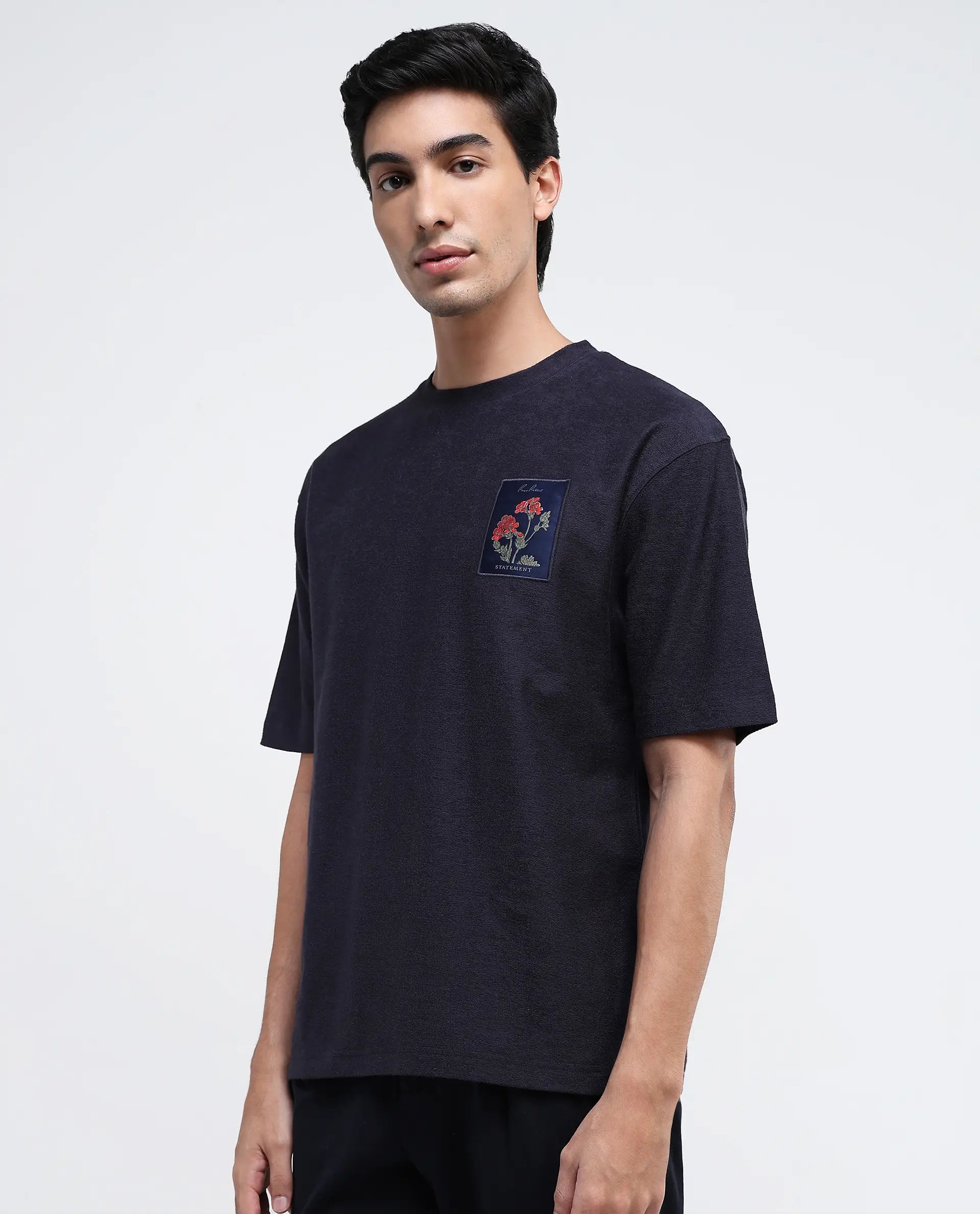 Rare Rabbit Men Loopet-1 Navy Cotton Lycra Fabric Half Sleeves Floral Print Pocket Detailing Oversized Fit Solid T-Shirt