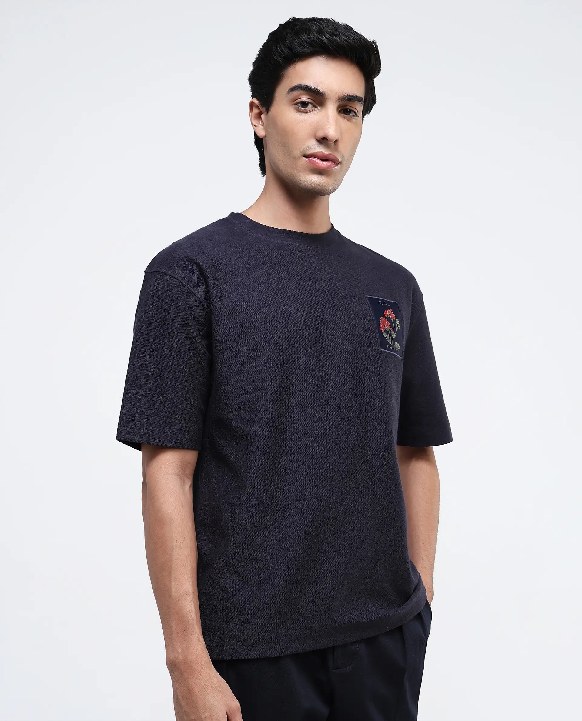 Rare Rabbit Men Loopet-1 Navy Cotton Lycra Fabric Half Sleeves Floral Print Pocket Detailing Oversized Fit Solid T-Shirt