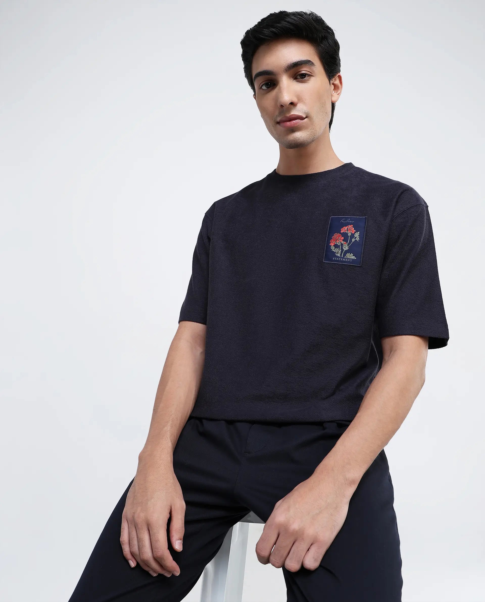 Rare Rabbit Men Loopet-1 Navy Cotton Lycra Fabric Half Sleeves Floral Print Pocket Detailing Oversized Fit Solid T-Shirt