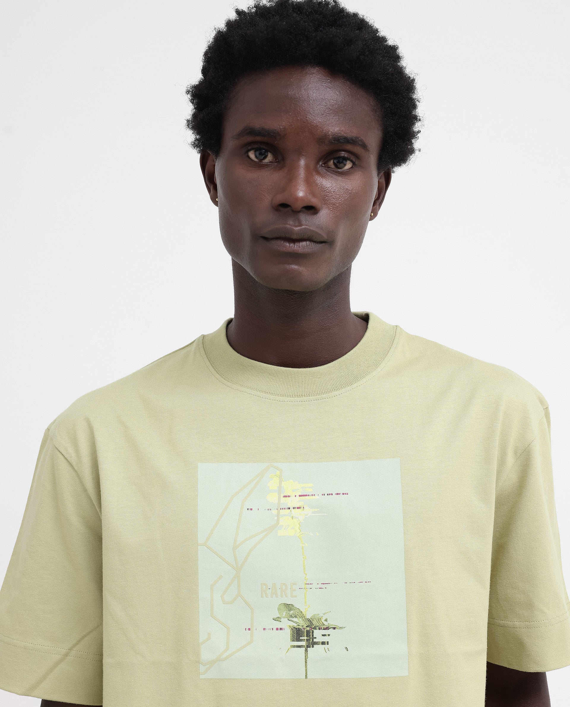 Rare Rabbit Articale Mens Luca Light Green Cotton Polyester Fabric Short Sleeve Crew Neck Oversized Fit Graphic Printed T-Shirt