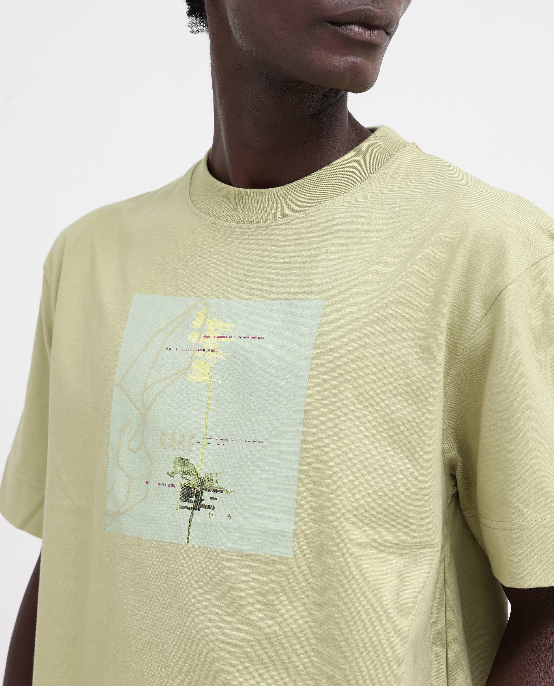Rare Rabbit Articale Mens Luca Light Green Cotton Polyester Fabric Short Sleeve Crew Neck Oversized Fit Graphic Printed T-Shirt