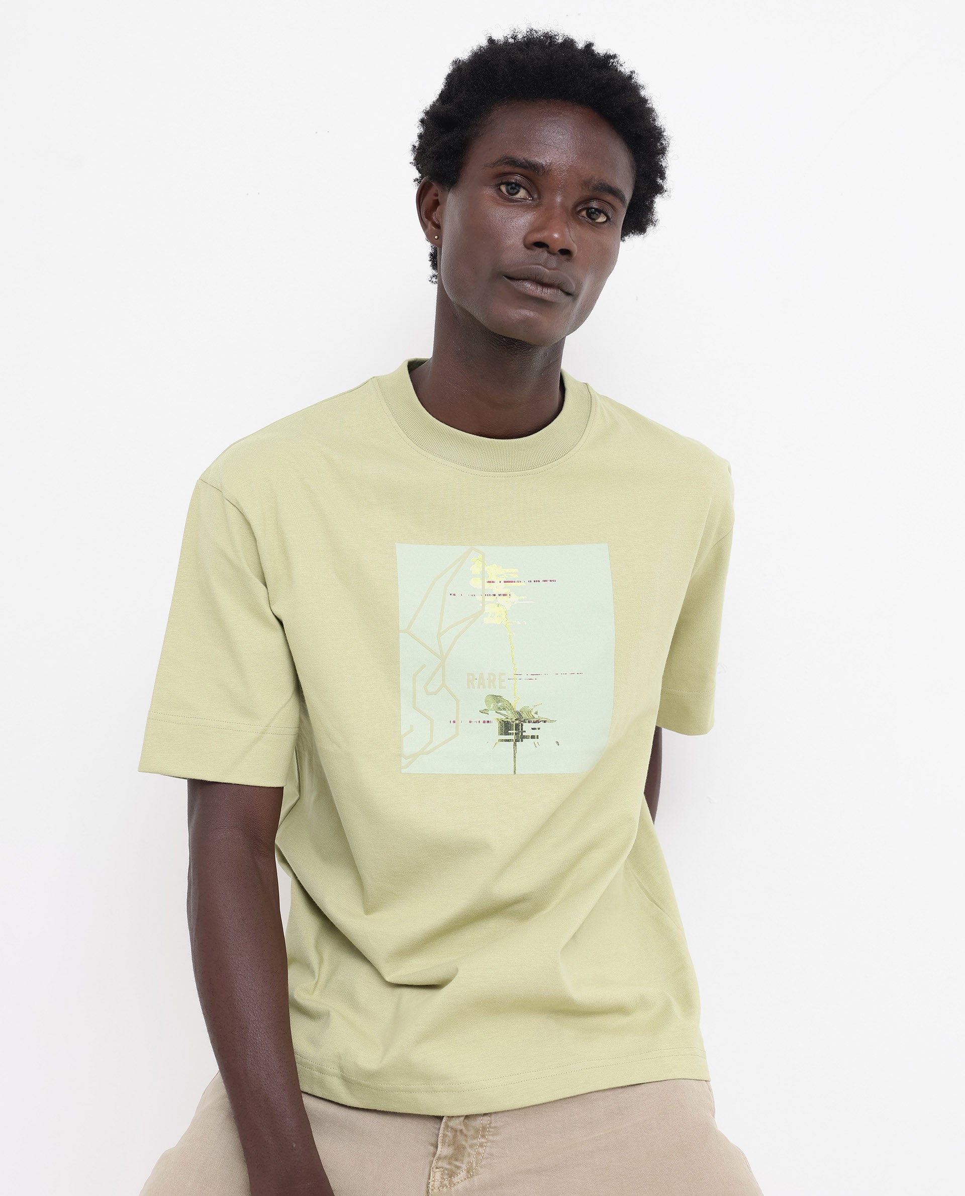 Rare Rabbit Articale Mens Luca Light Green Cotton Polyester Fabric Short Sleeve Crew Neck Oversized Fit Graphic Printed T-Shirt