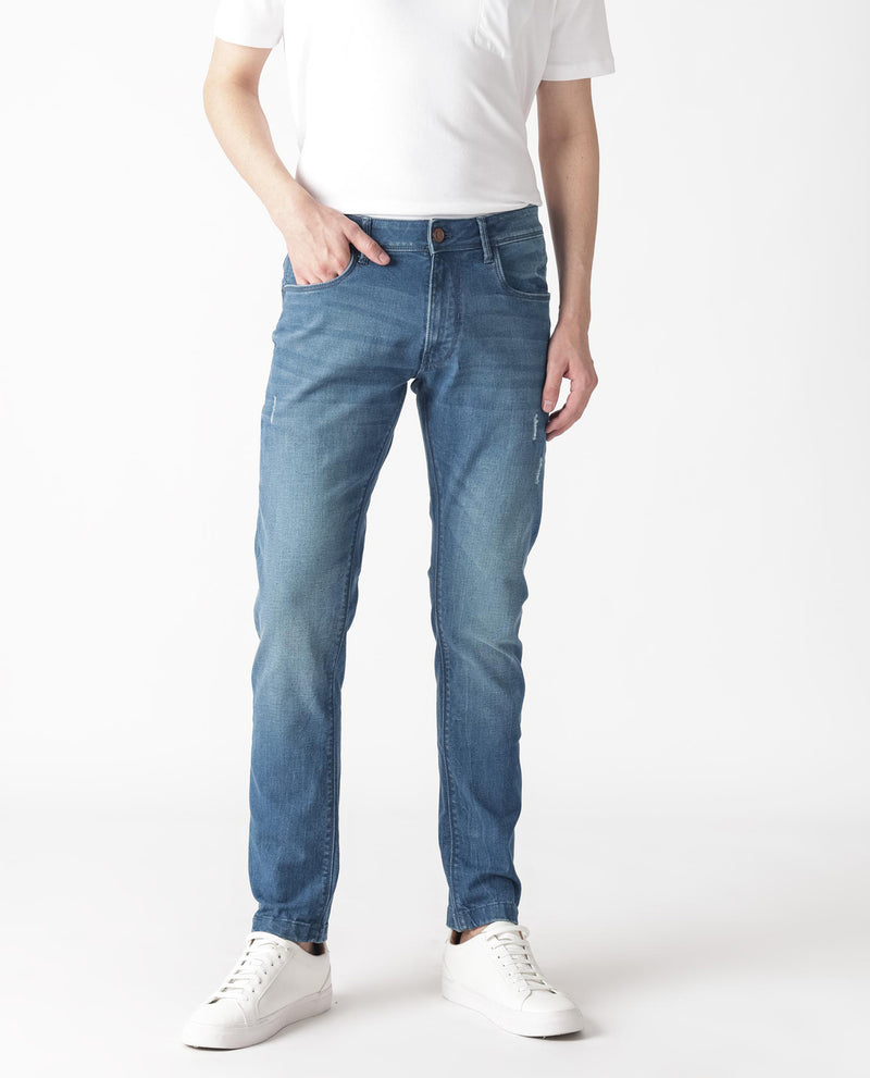 SLIM FIT MID WASH JEANS WITH MILD DISTRESS