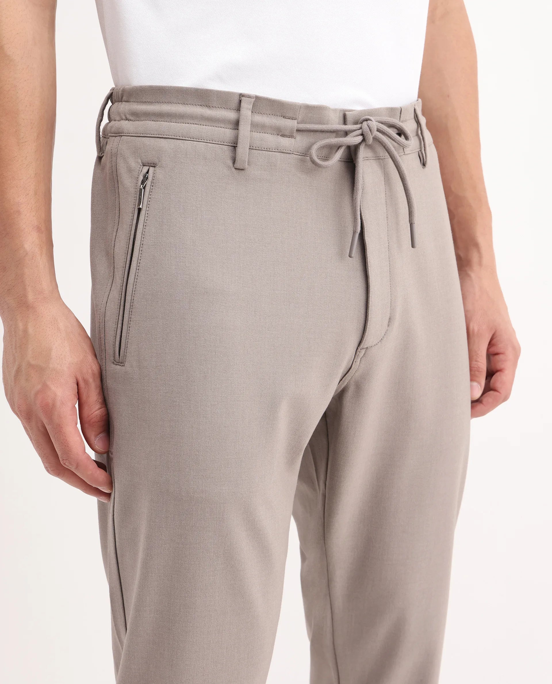 Rare Rabbit Men's Move-25 Beige Polyester Blend Plain Regular Fit Trouser