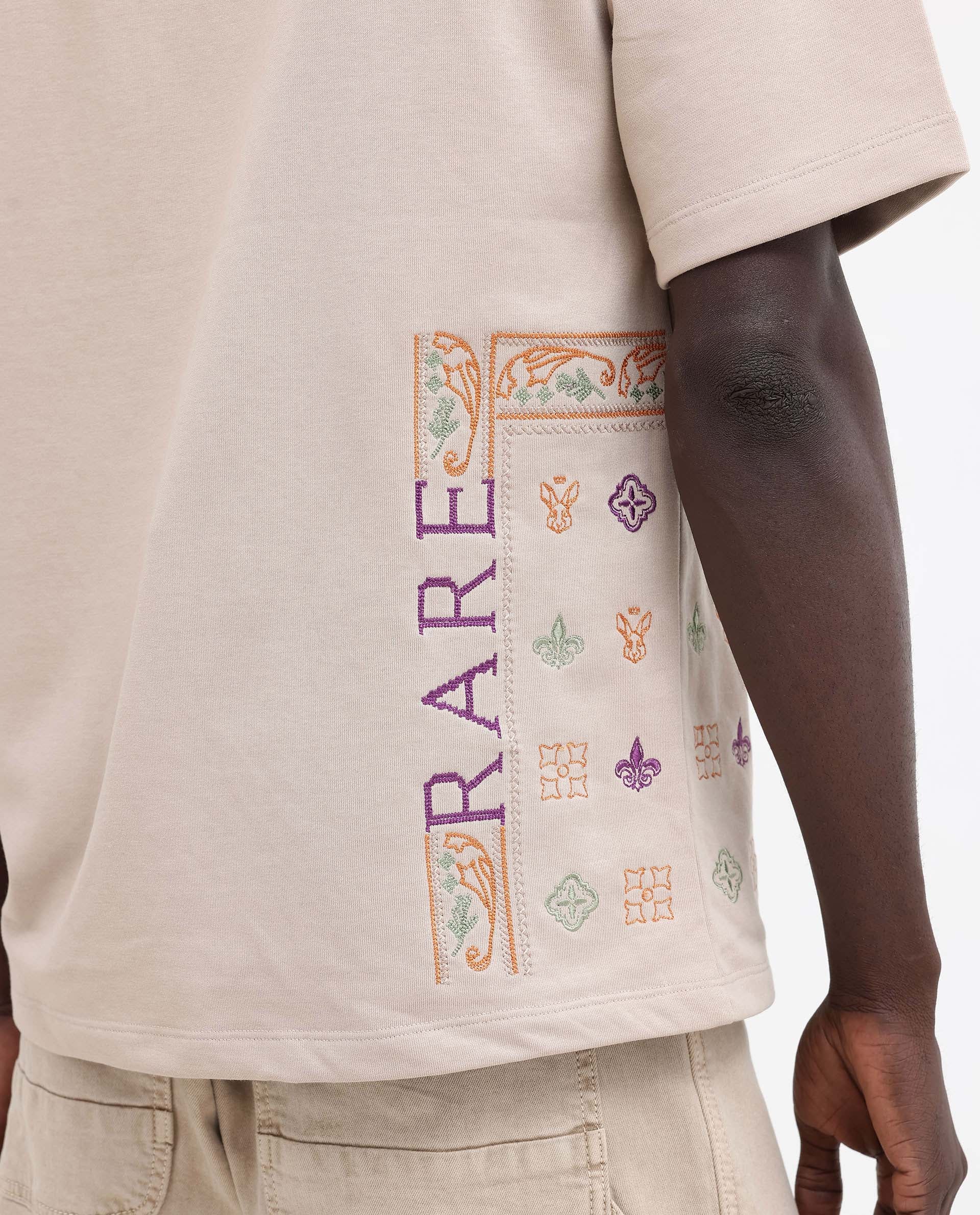 Rare Rabbit Mens Myro Beige Cotton Polyester Fabric Oversized Fit Embroidered T-Shirt