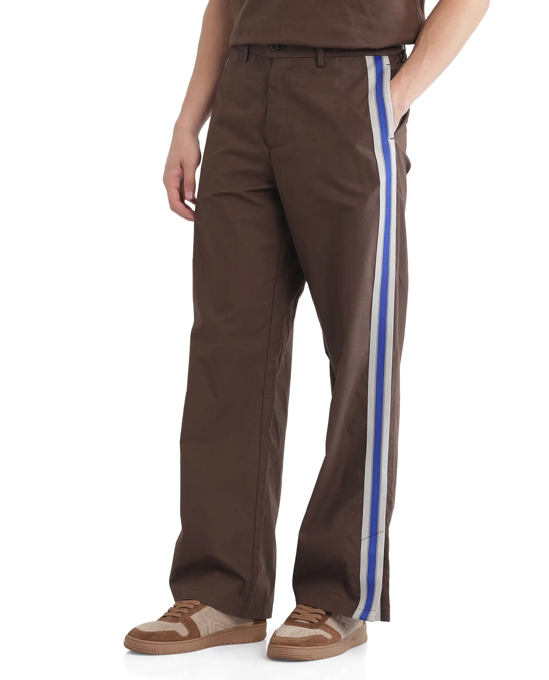 Rare Rabbit Men Newnon Brown Cotton Fabric Mid Rise Baggy Fit Side Slit with Snap Button Closure Tape Detailing Track Pant