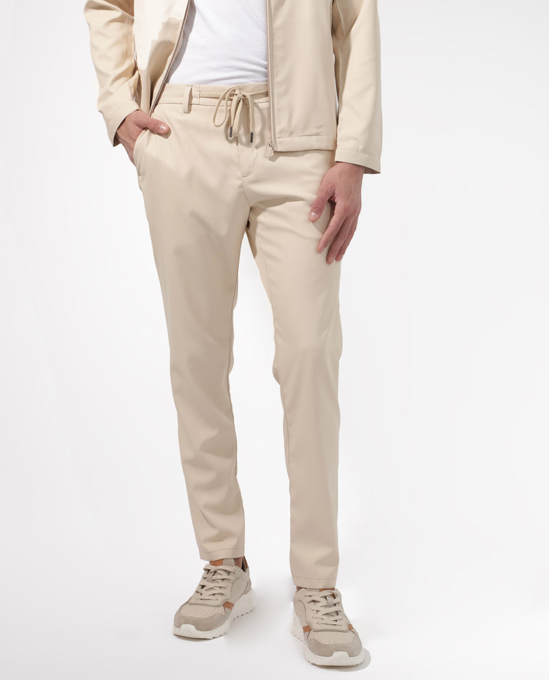 Rare Rabbit Men's Nimb Beige Polyester Fabric Drawstring And Button Closure High Rise Regular Fit Solid Trousers