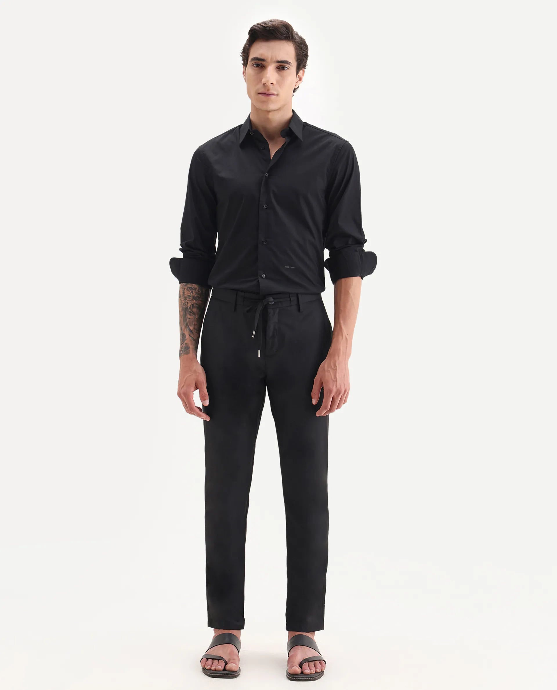 Rare Rabbit Men's Nimb Black Polyester Fabric Drawstring And Button Closure High Rise Regular Fit Solid Trousers