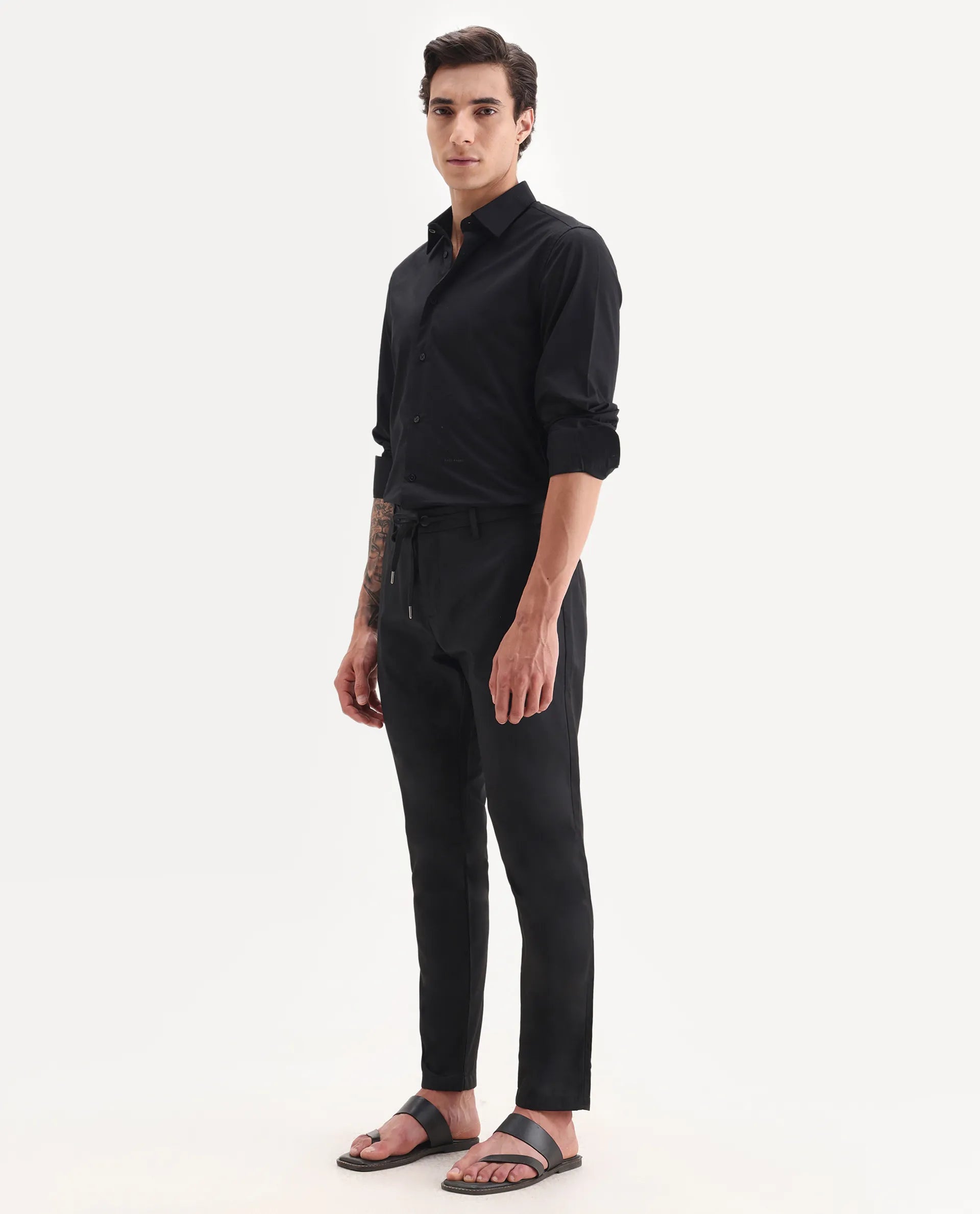 Rare Rabbit Men's Nimb Black Polyester Fabric Drawstring And Button Closure High Rise Regular Fit Solid Trousers