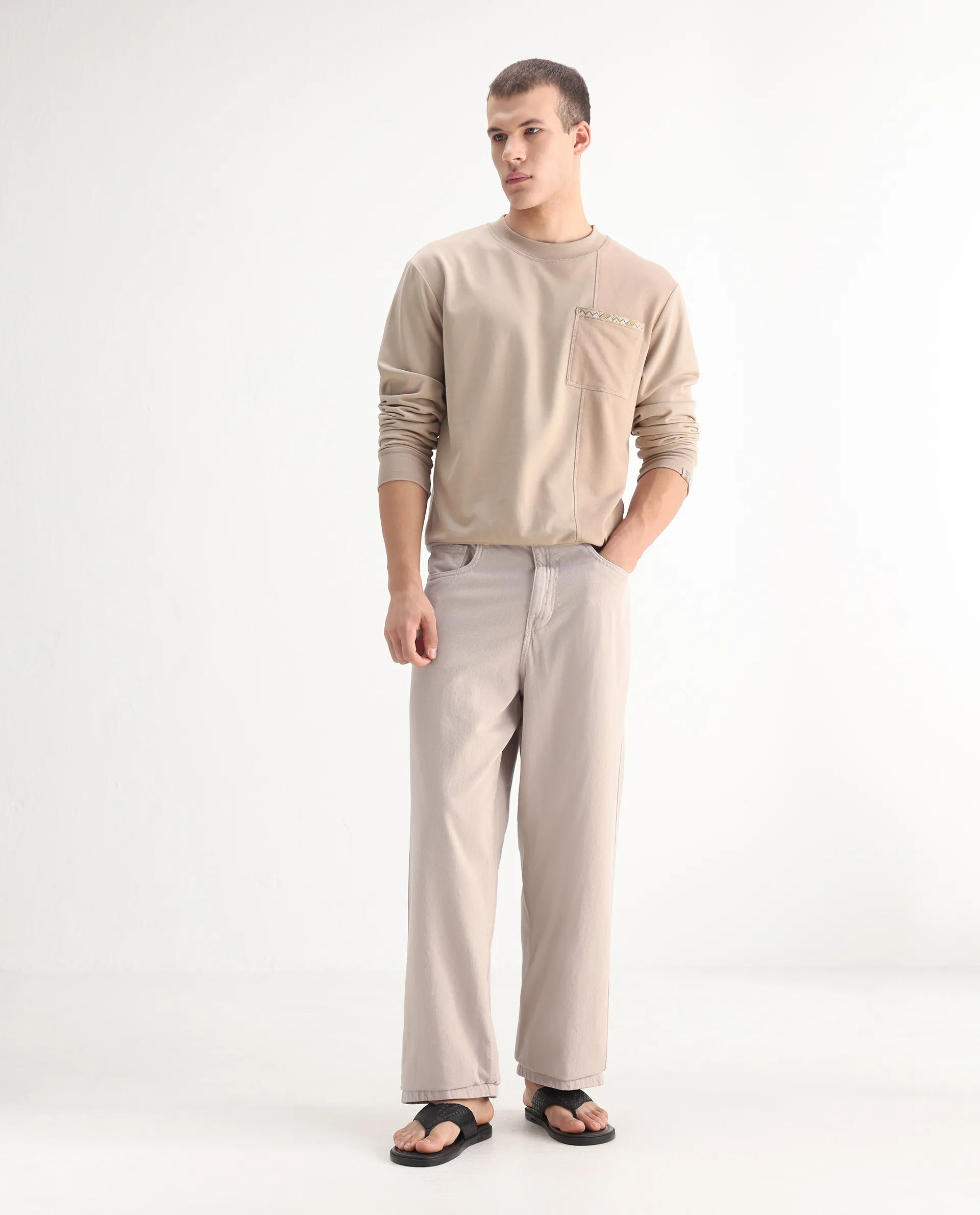 Rare Rabbit Men's Niretor-2 Beige Cotton Plain Baggy Fit Jeans