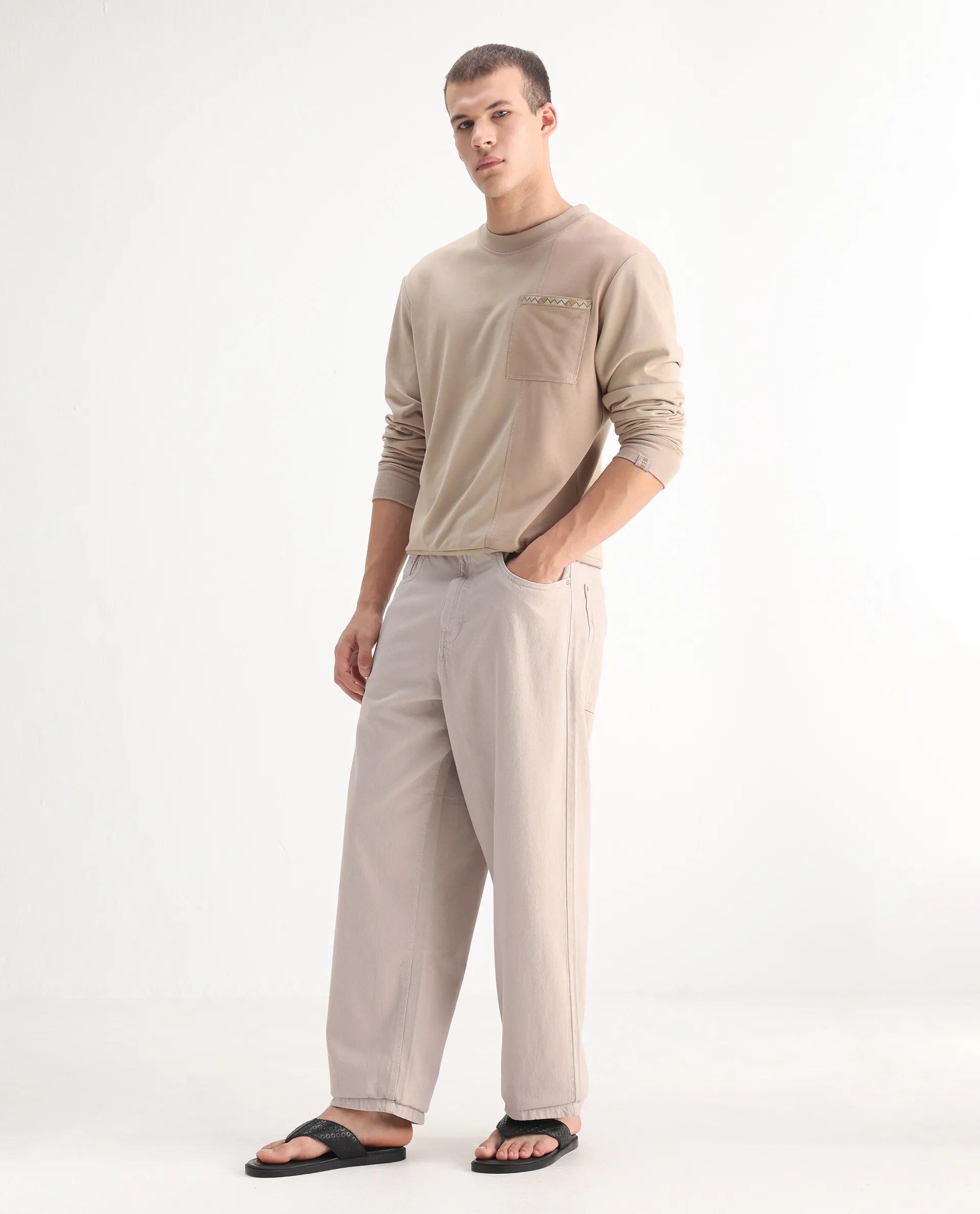 Rare Rabbit Men's Niretor-2 Beige Cotton Plain Baggy Fit Jeans