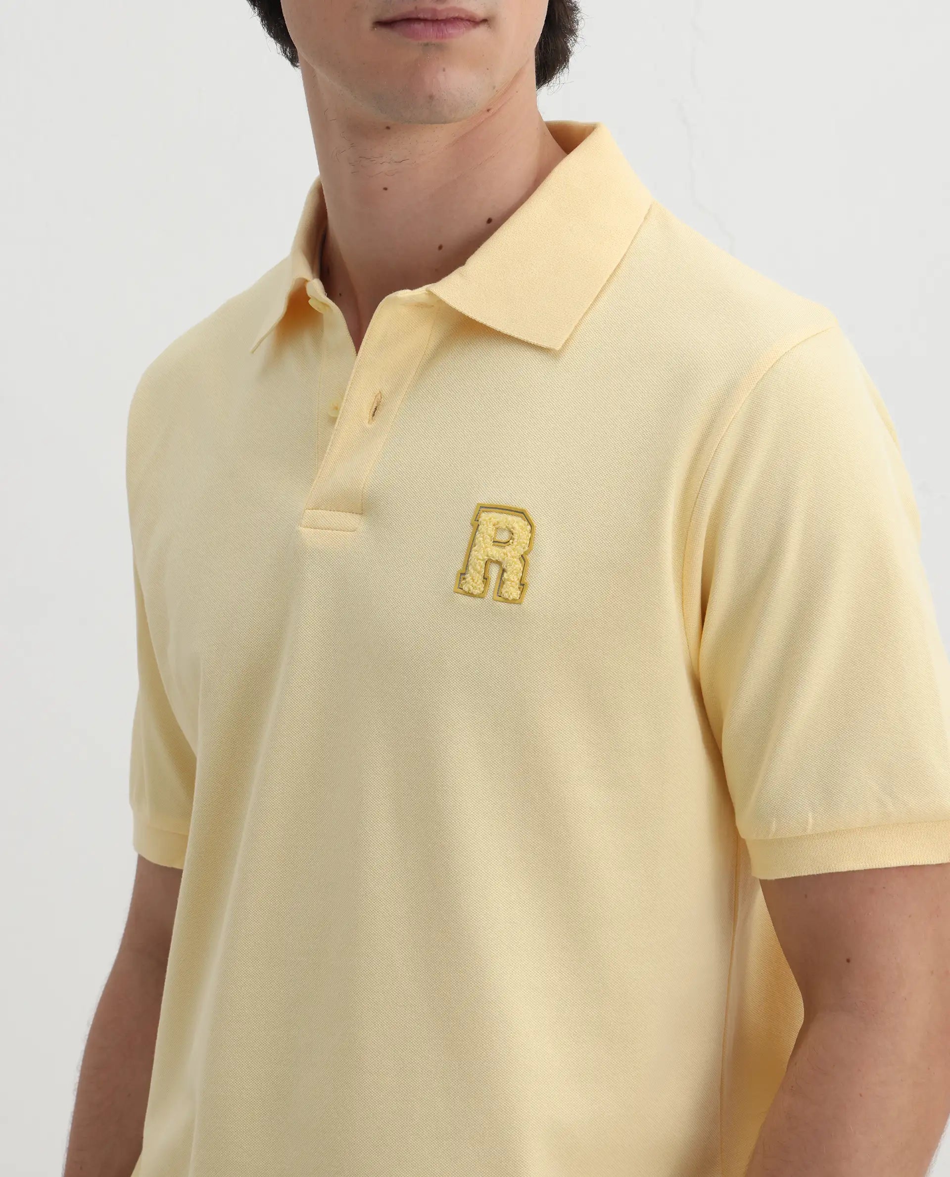 Rare Rabbit Men's Otes Pastel Yellow Cotton Plain Regular Fit Half Sleeve Polo