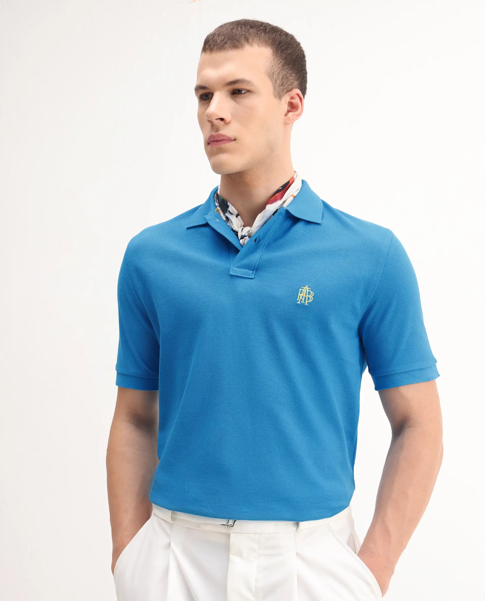 Rare Rabbit Men's Pare-1 Flouroscent Blue Cotton Plain Regular Fit Half Sleeve Polo