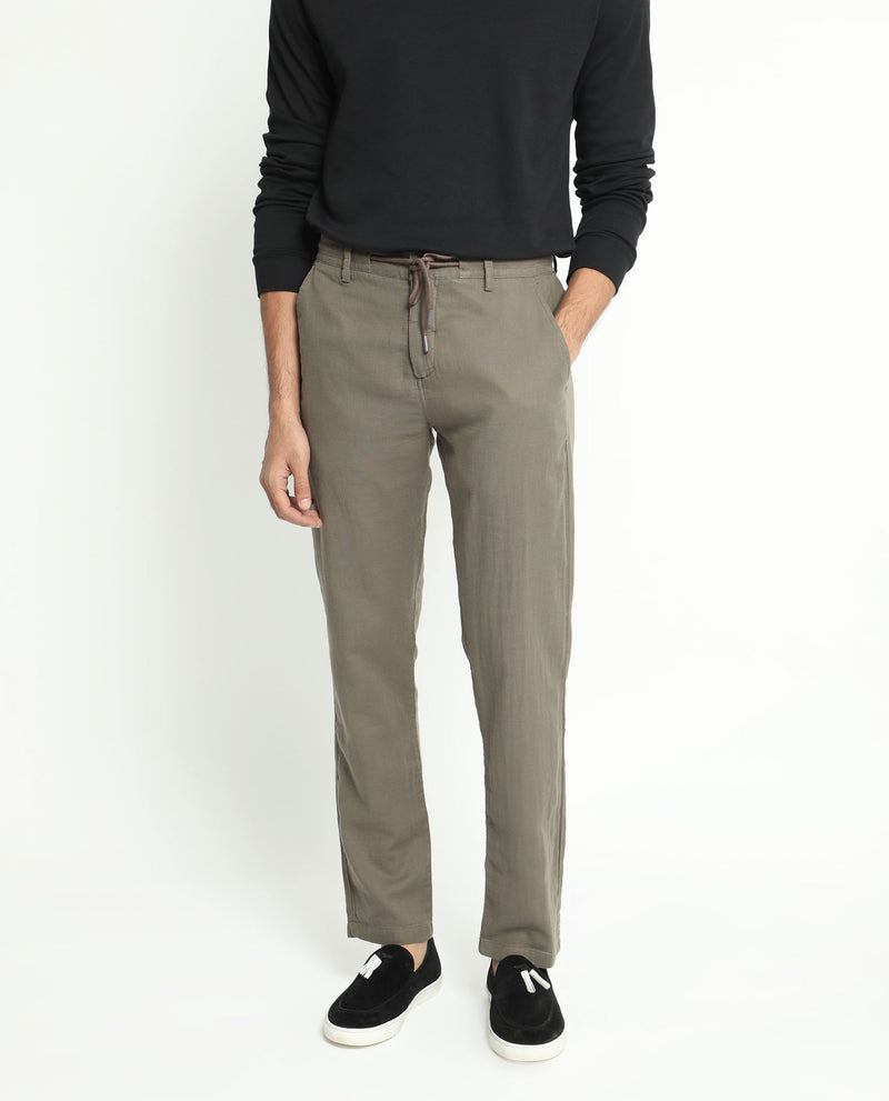 CREASE EFFECT TROUSERS
