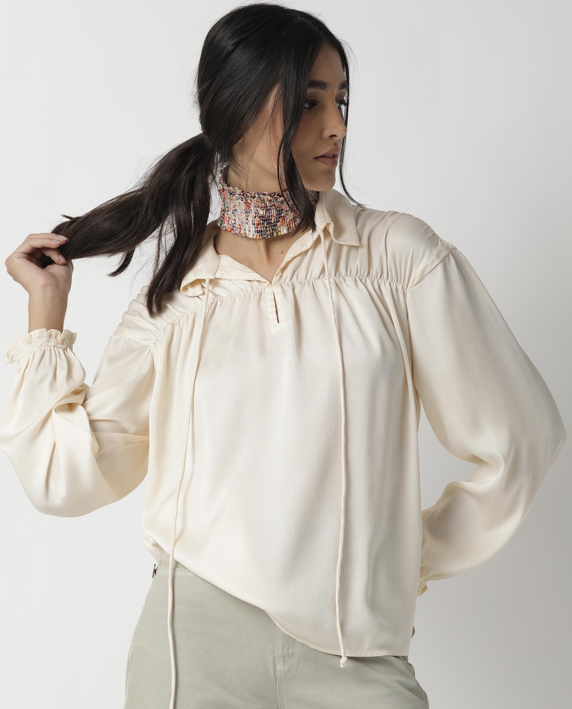 Rareism Women Paxo Off White Poly Cotton Fabric Regular Fit Tie-Up Neck Full Sleeves Solid Top